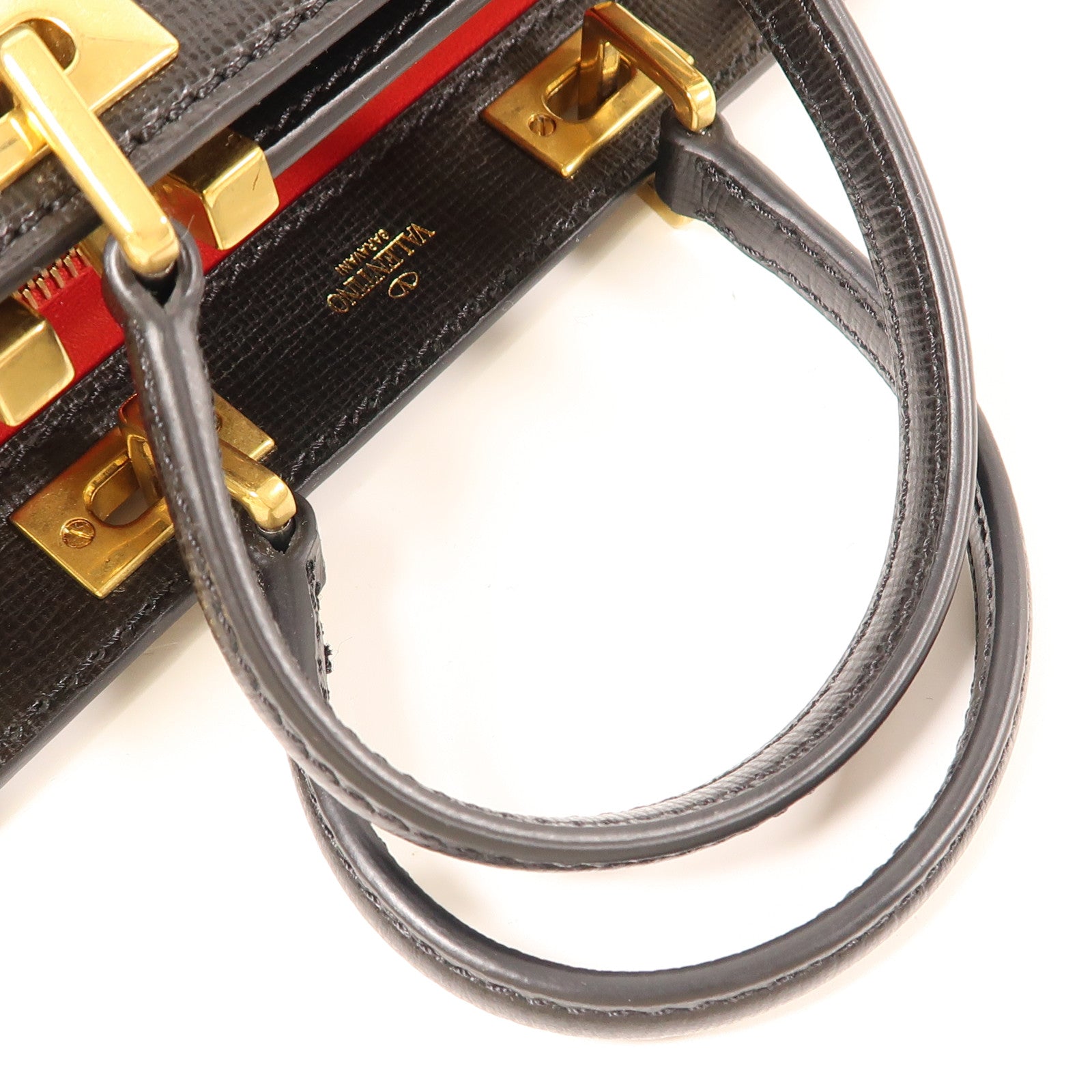 Valentino 牛皮皮革Rockstud Alcove金扣手挽袋