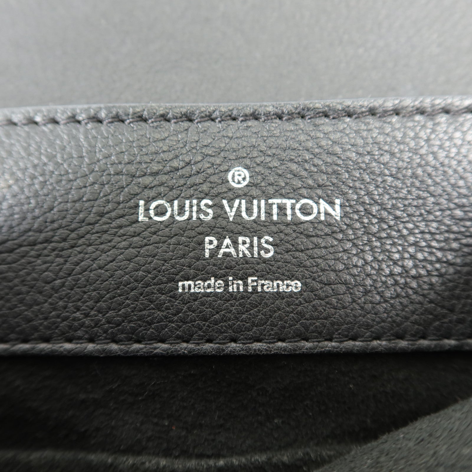 LOUIS VUITTON 牛皮皮革Lock Me Backpack銀扣背包