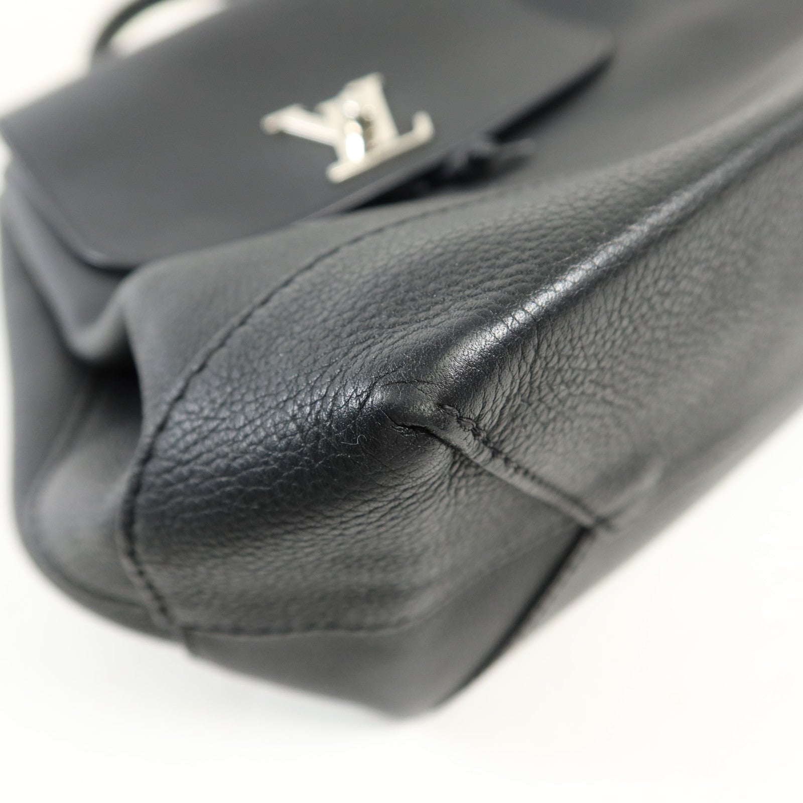 LOUIS VUITTON 牛皮皮革Lock Me Backpack銀扣背包