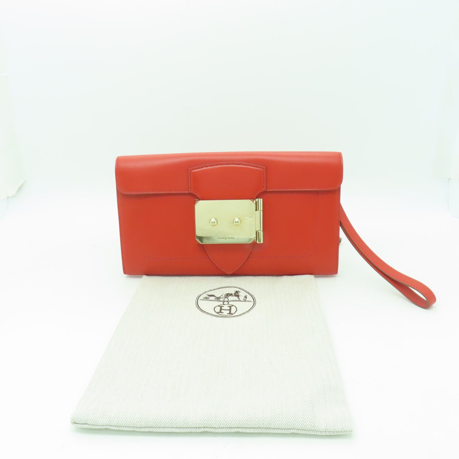 HERMES 【激減優惠】Tadelakt皮革Sac Rock Clutch金扣手拿包Capucine紅色