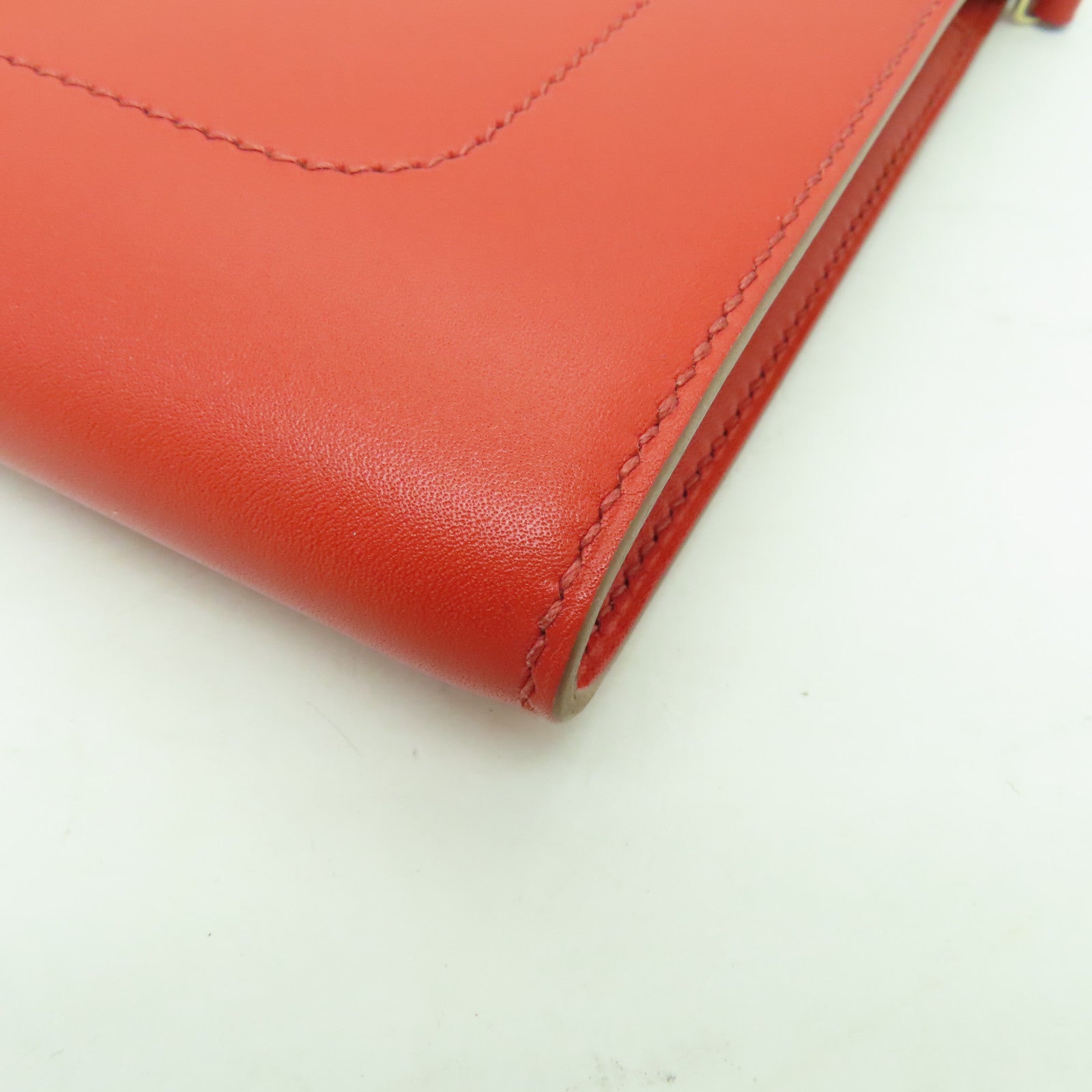 HERMES 【激減優惠】Tadelakt皮革Sac Rock Clutch金扣手拿包Capucine紅色
