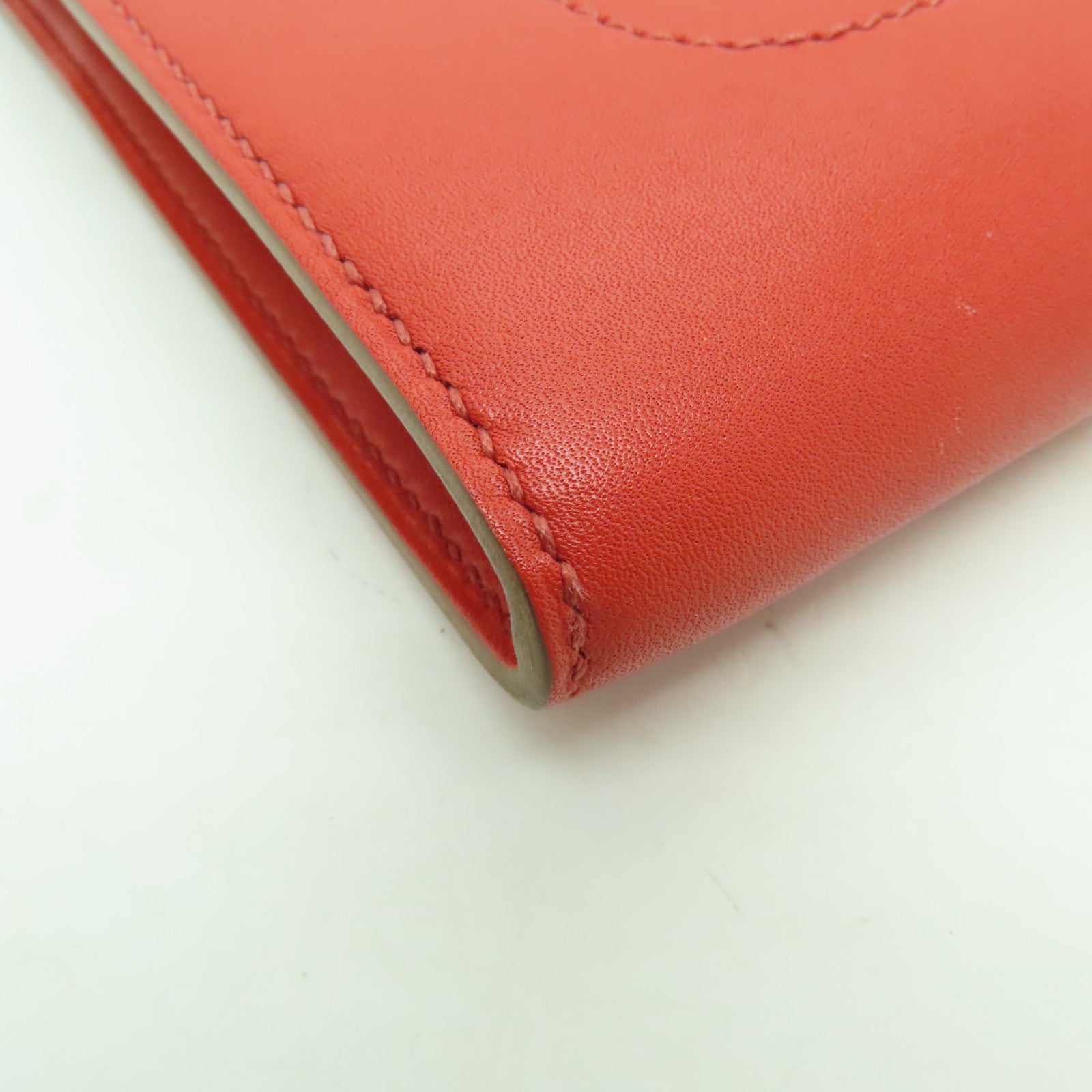 HERMES 【激減優惠】Tadelakt皮革Sac Rock Clutch金扣手拿包Capucine紅色