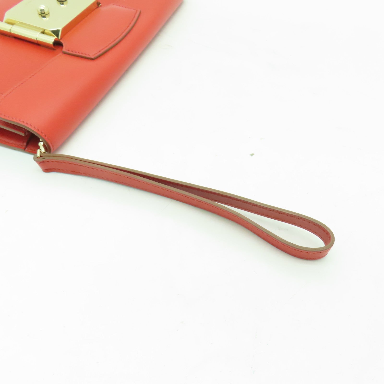HERMES 【激減優惠】Tadelakt皮革Sac Rock Clutch金扣手拿包Capucine紅色