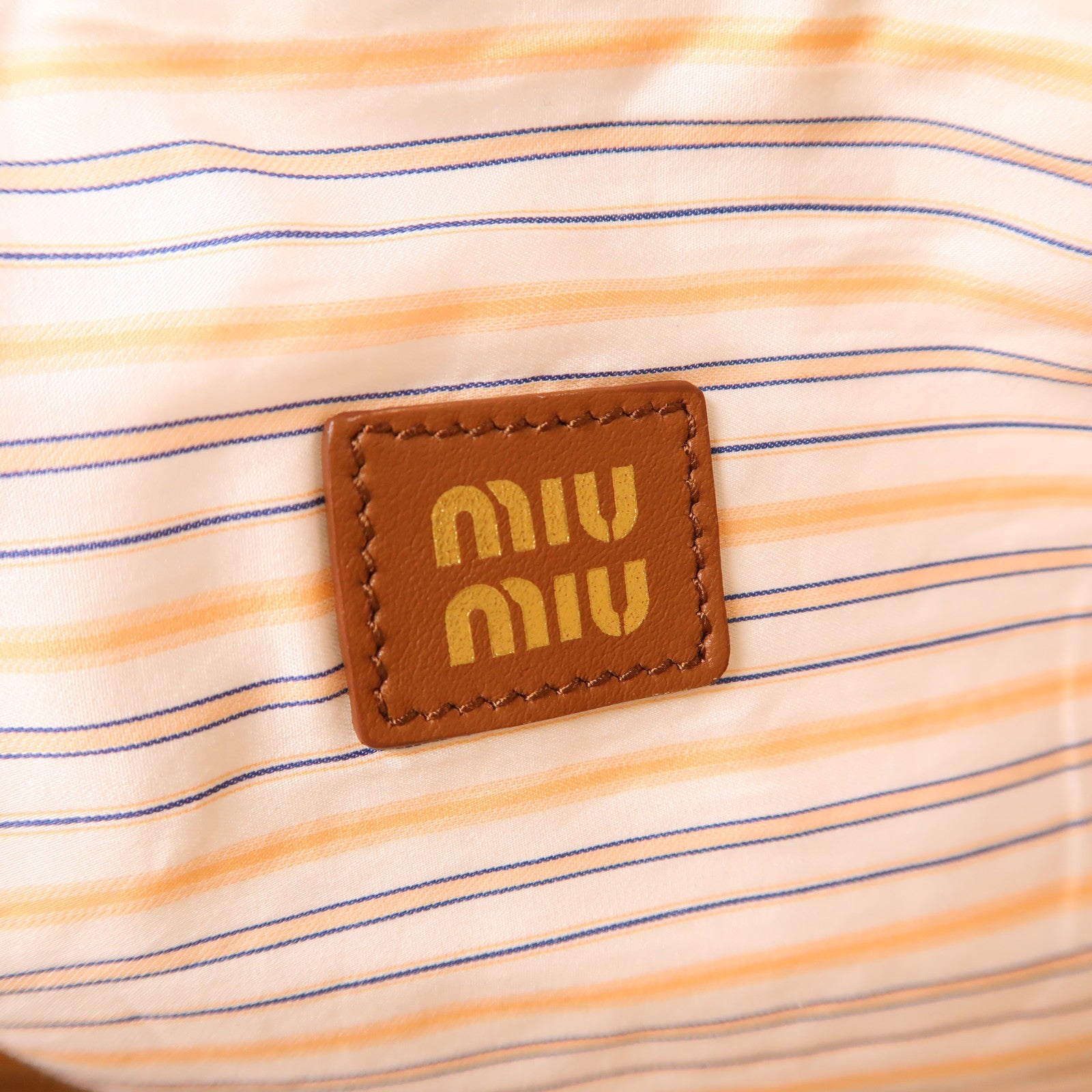 Miu Miu 帆布Pouch手拿包