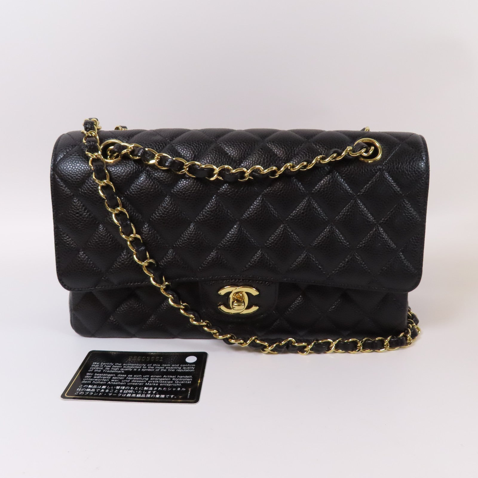 CHANEL 菱格Caviar皮革Classic Flap Bag金扣鏈帶肩背袋黑色