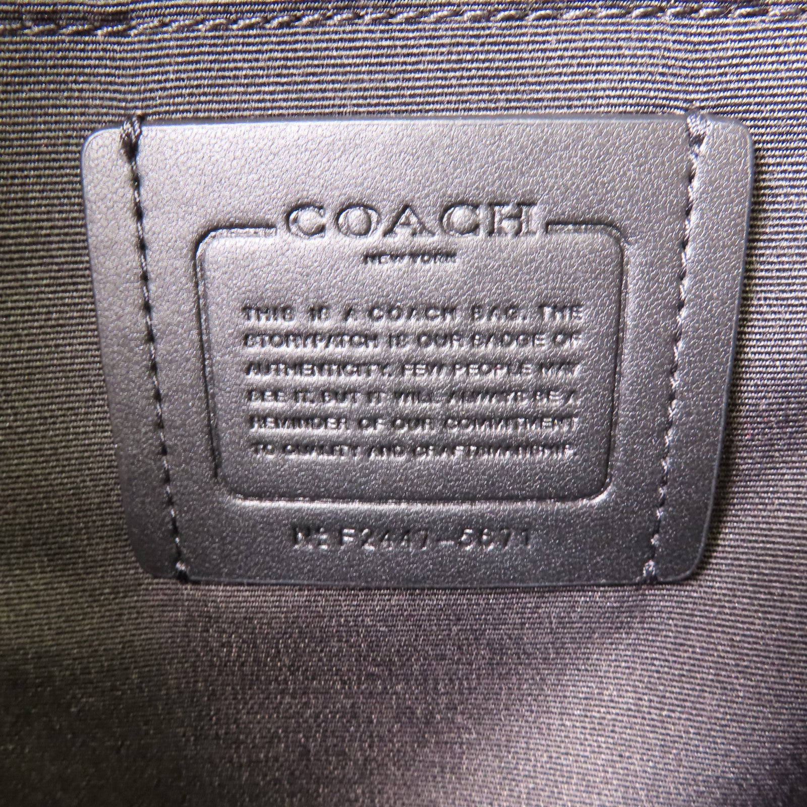 COACH 塗層帆布Rucksack金扣背包