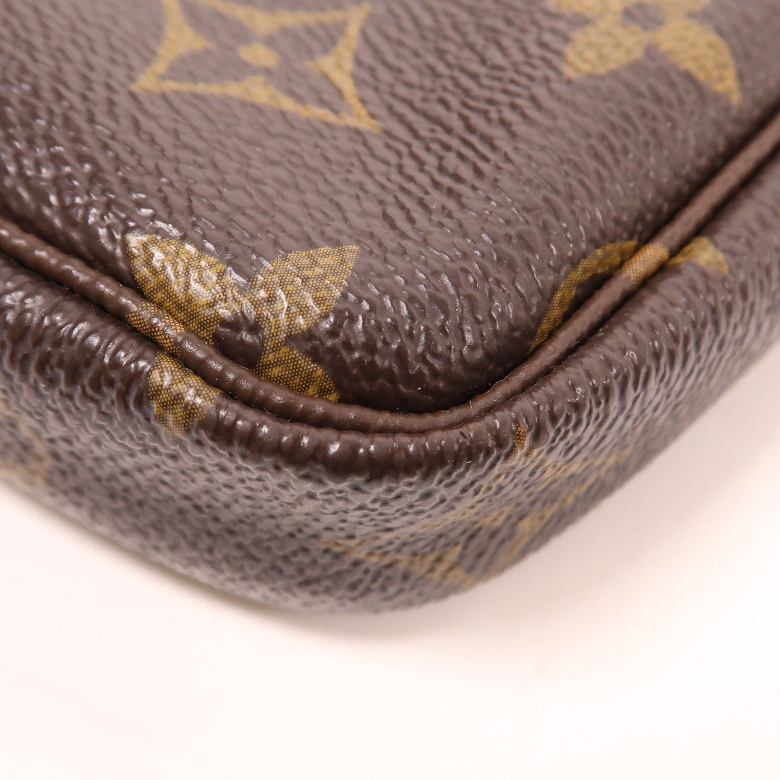 LOUIS VUITTON Monogram Mini Pochette Accessoires金扣手挽袋