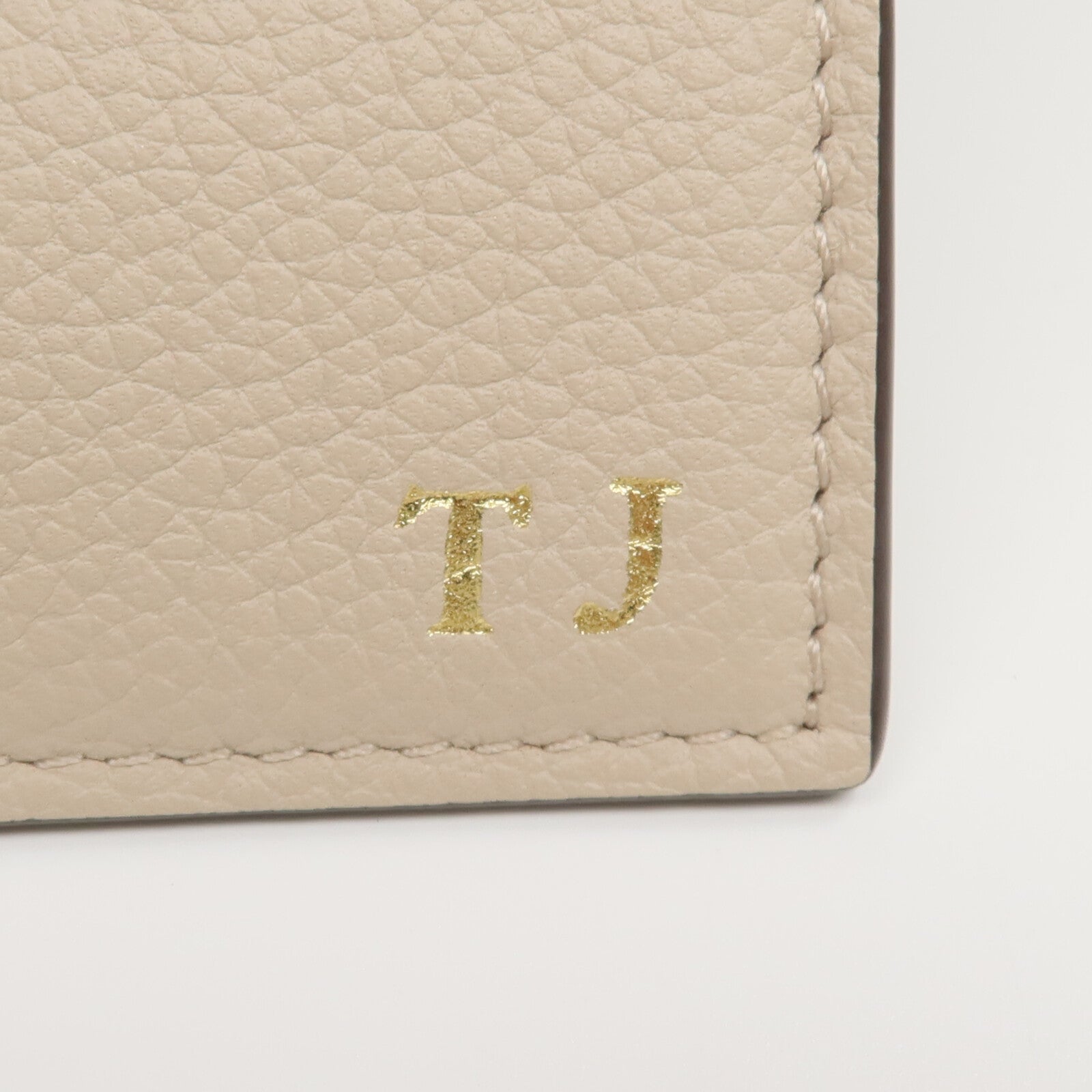 LOUIS VUITTON 牛皮皮革LockMini錢包