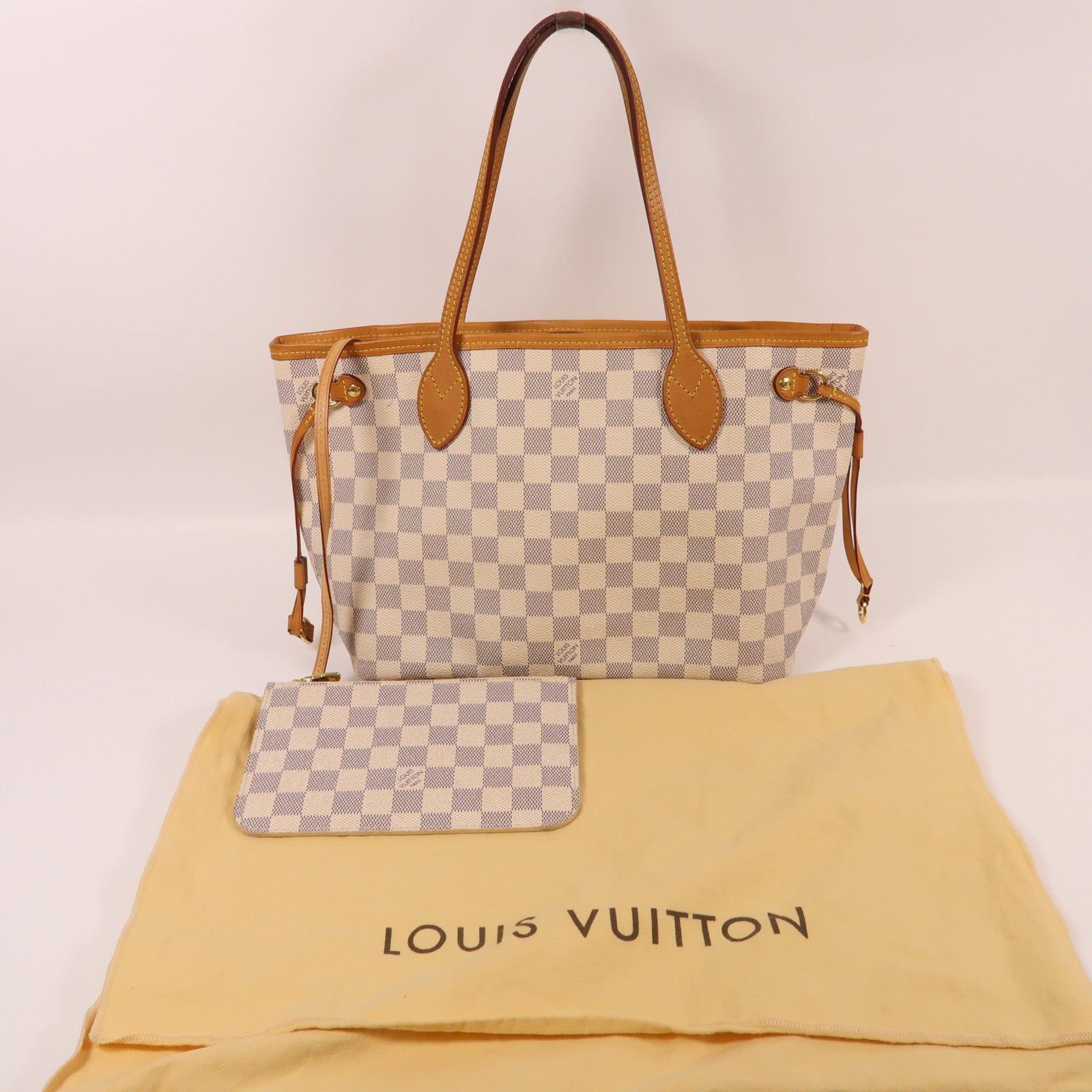 LOUIS VUITTON Damier NeverFull PM金扣手挽袋白色