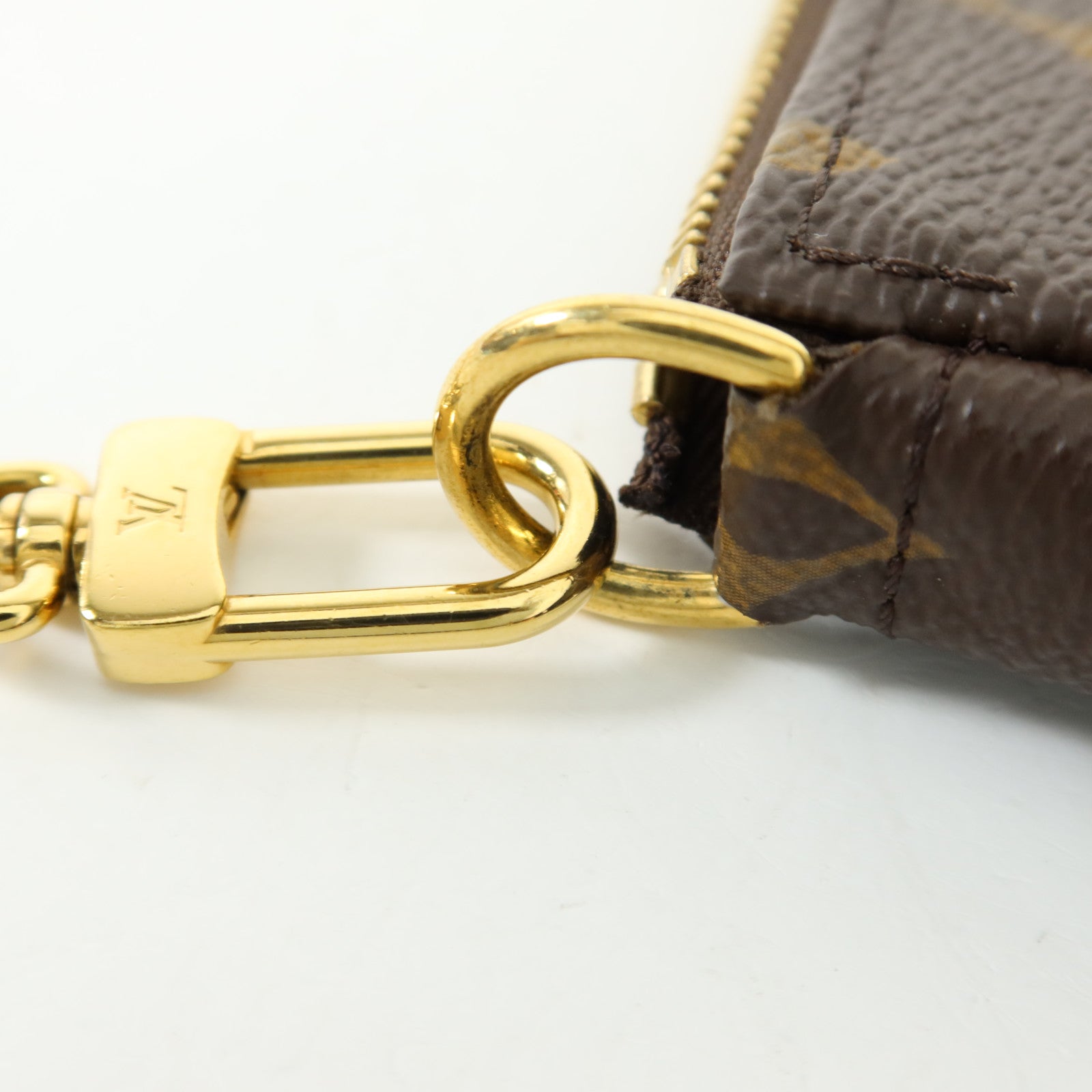LOUIS VUITTON Monogram Mini Pochette Accessoires金扣手挽袋
