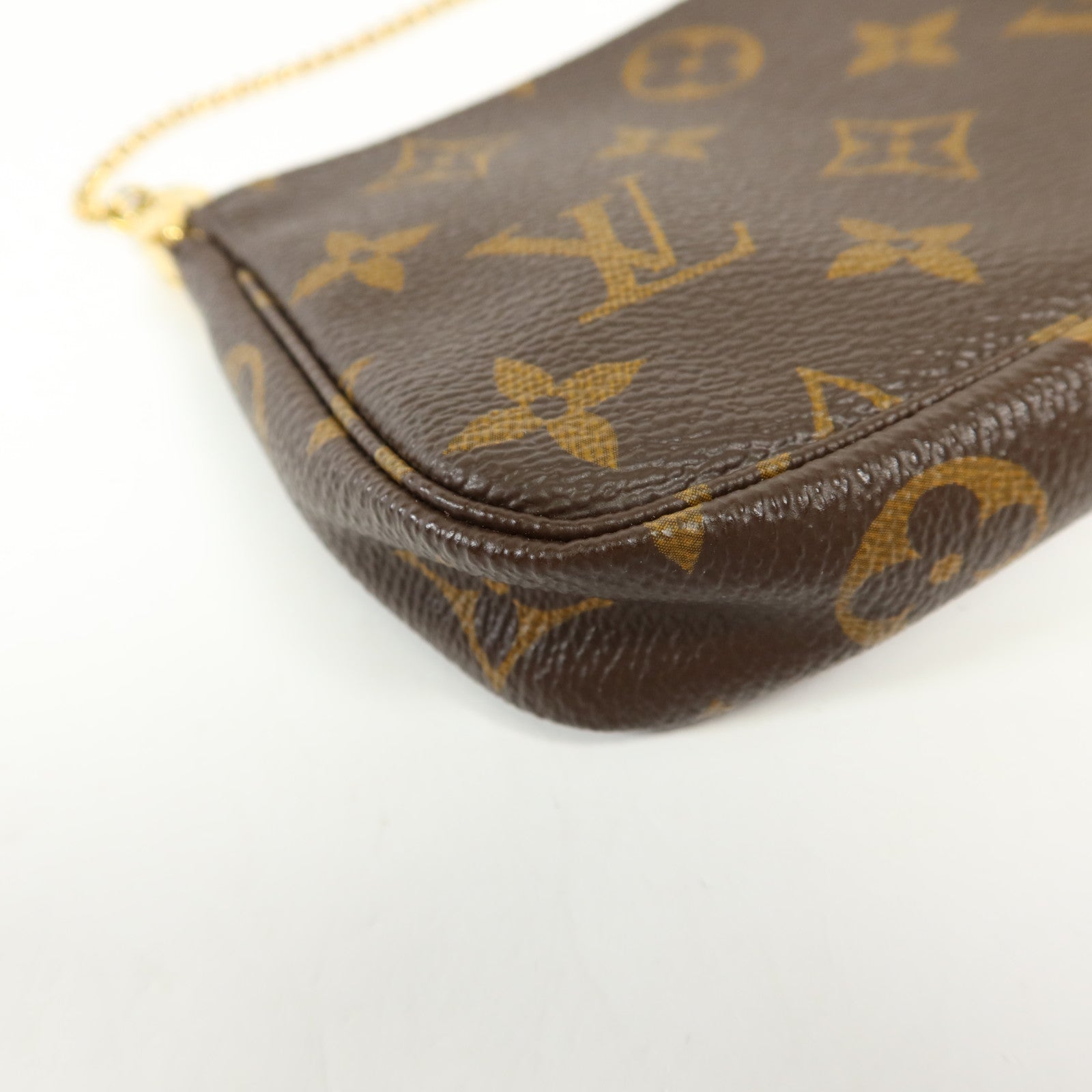 LOUIS VUITTON Monogram Mini Pochette Accessoires金扣手挽袋