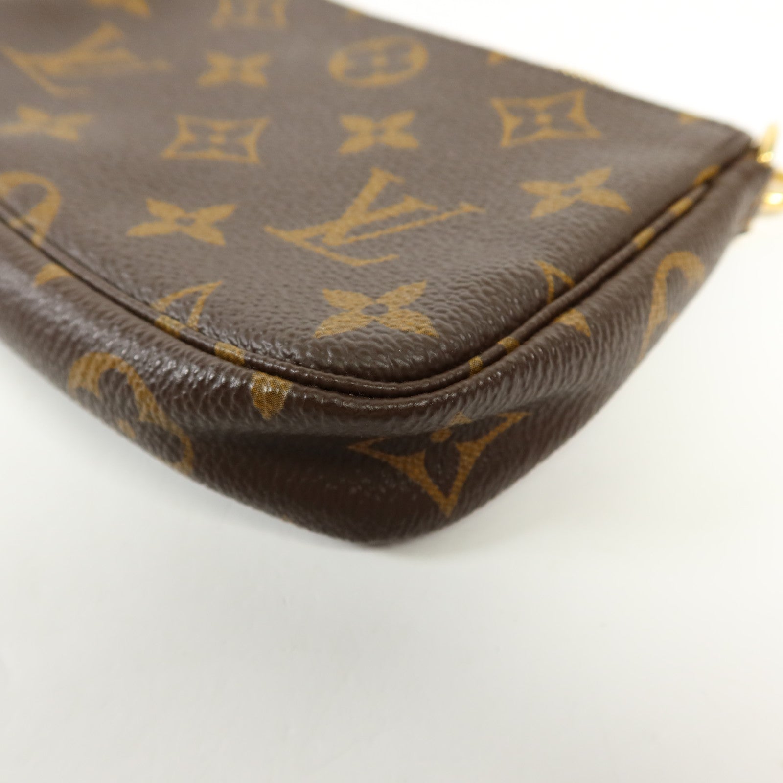 LOUIS VUITTON Monogram Mini Pochette Accessoires金扣手挽袋