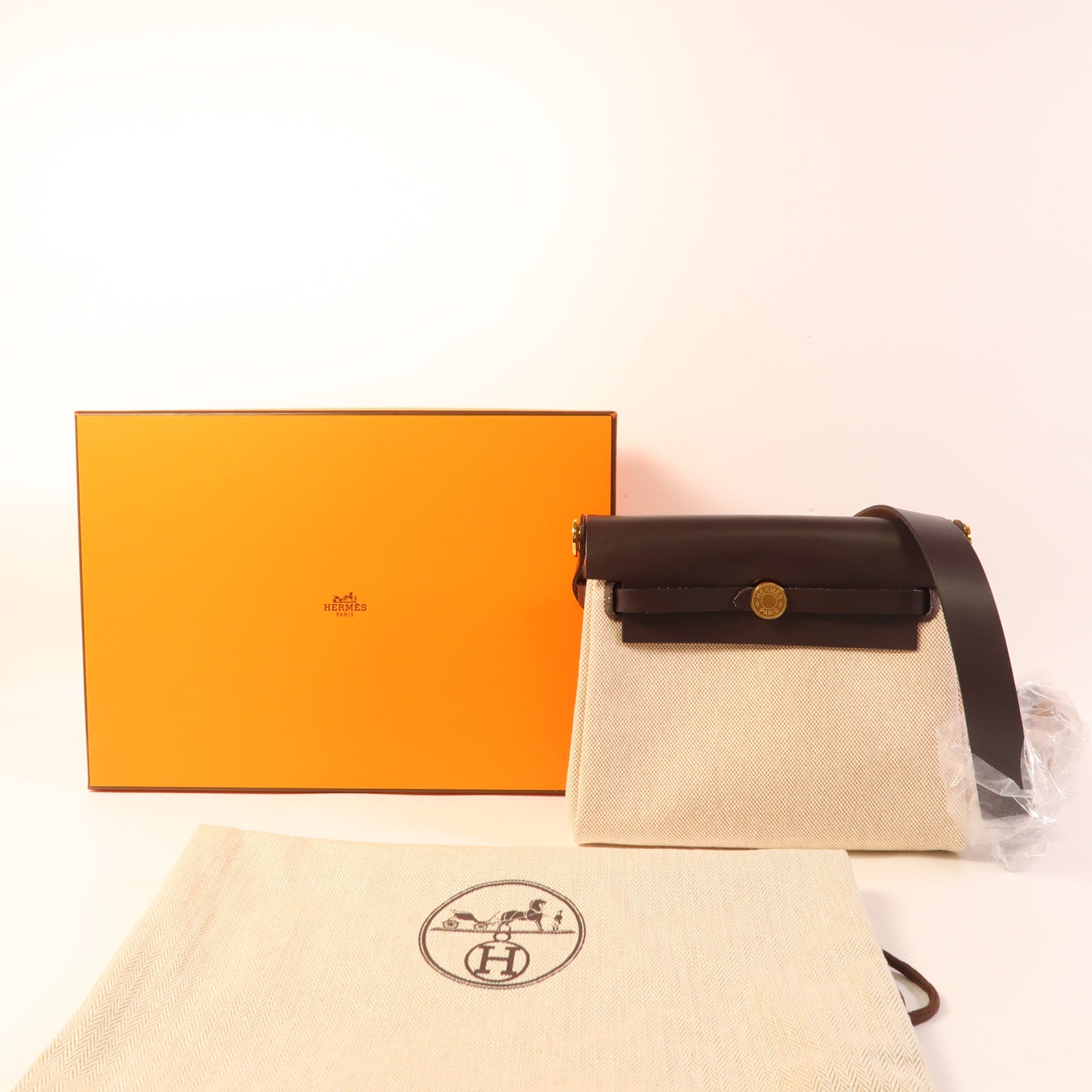 HERMES Swift皮革/帆布Herbag Zip Rt 20金扣肩背袋Chocolate