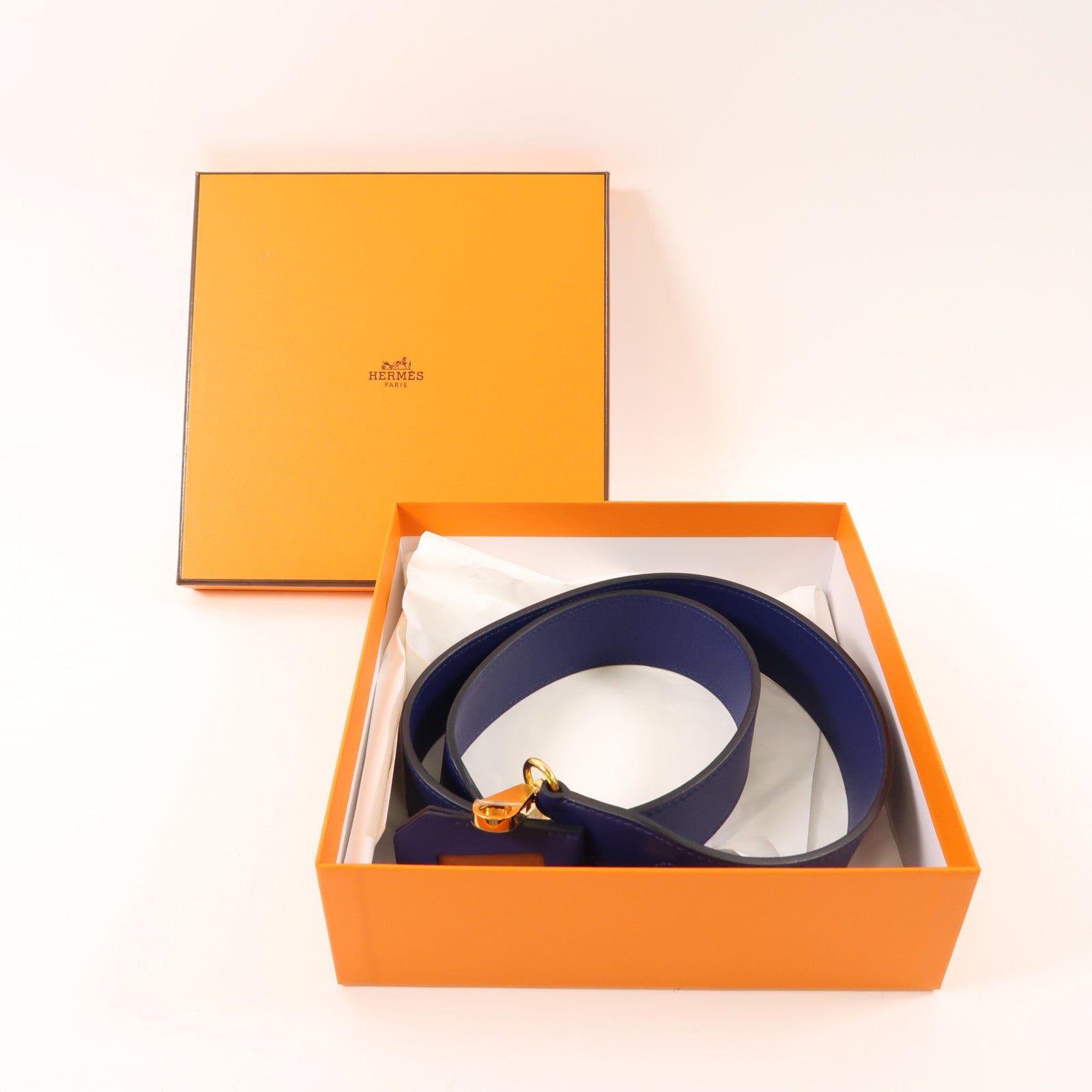 HERMES Swift皮革Clochette Bag Strap金扣肩帶藍色