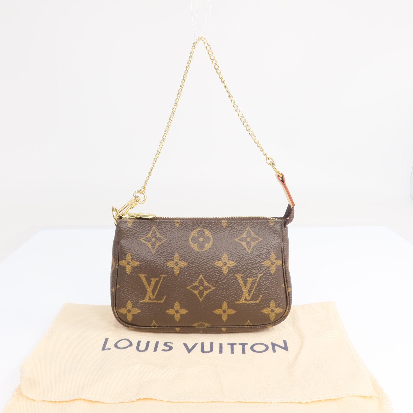 LOUIS VUITTON Monogram Mini Pochette Accessoires金扣手挽袋