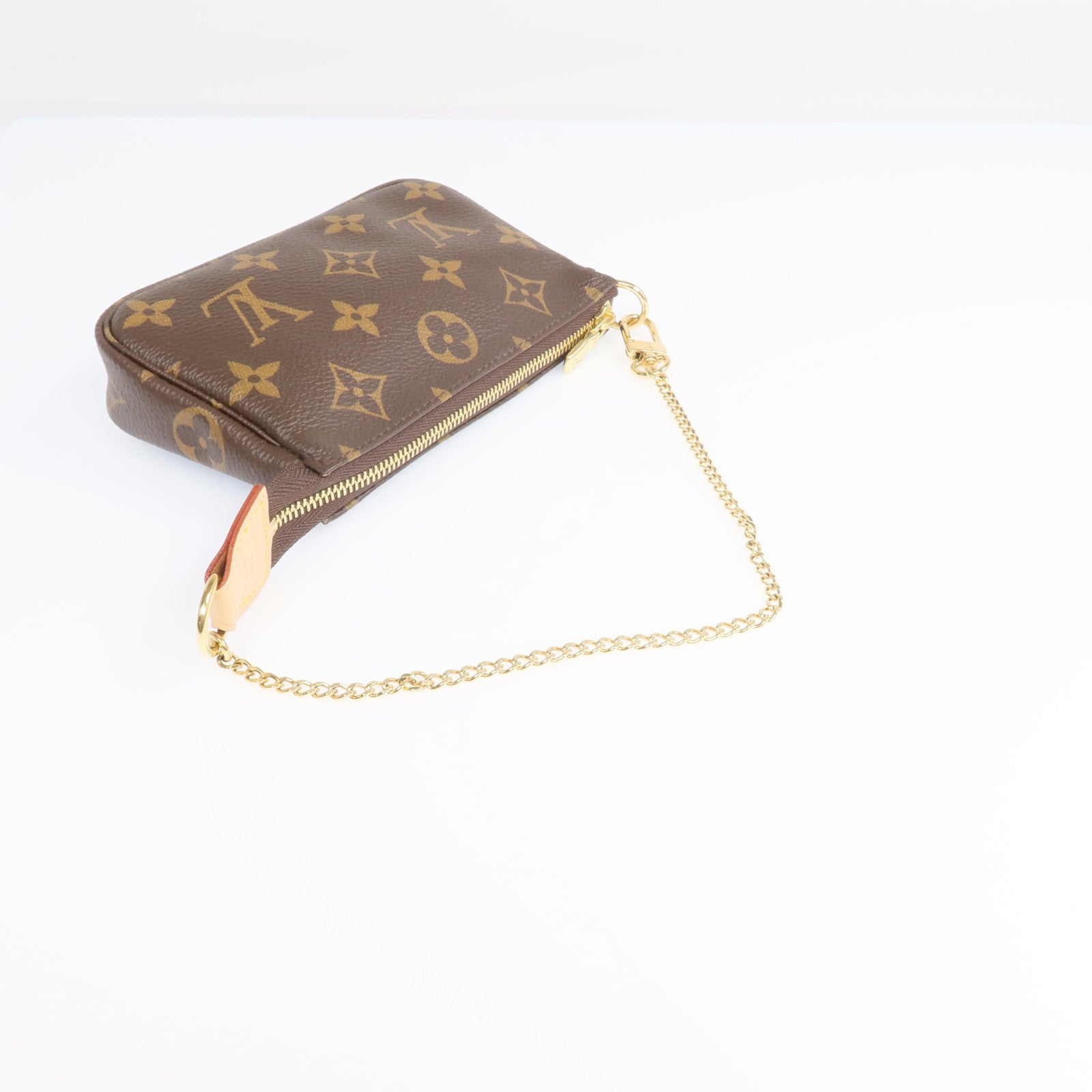 LOUIS VUITTON Monogram Mini Pochette Accessoires金扣手挽袋