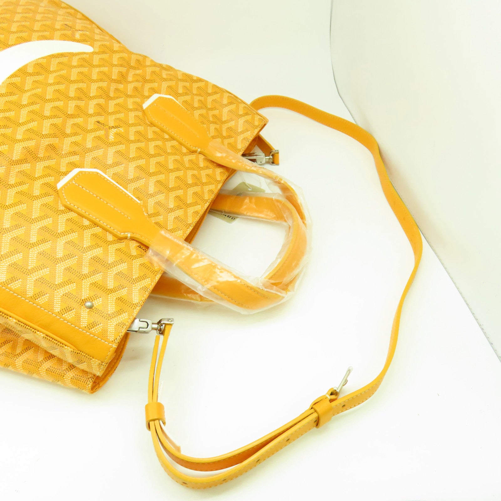 GOYARD 【清倉大減價】塗層帆布 Goyardine Voltaire Smile Tote銀扣手挽袋黃色