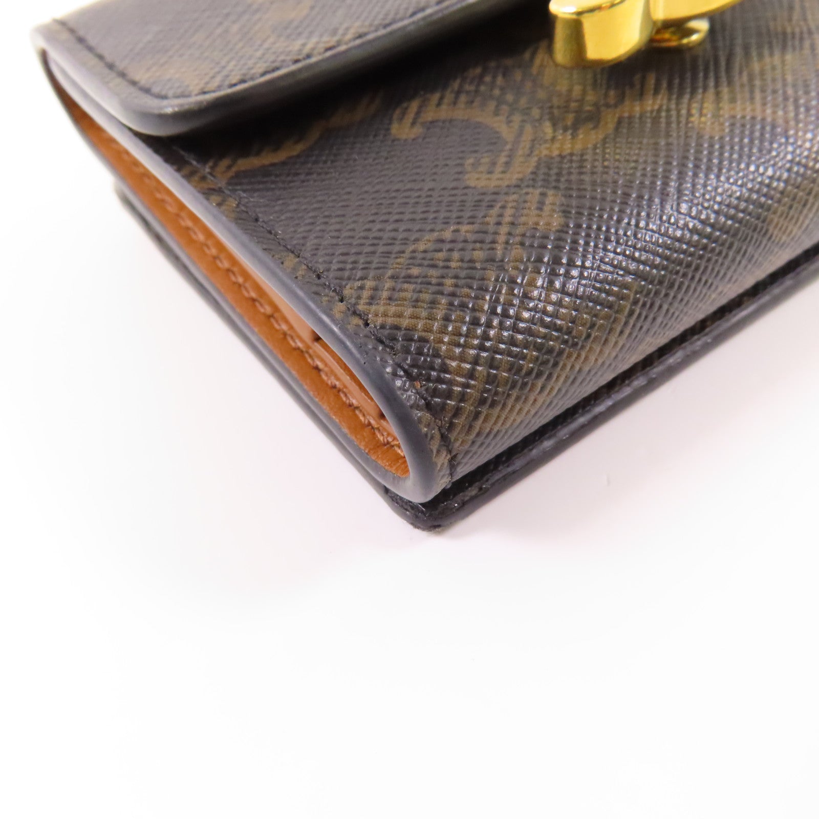 CELINE 塗層帆布Triomphe Trifold Wallet金扣錢包
