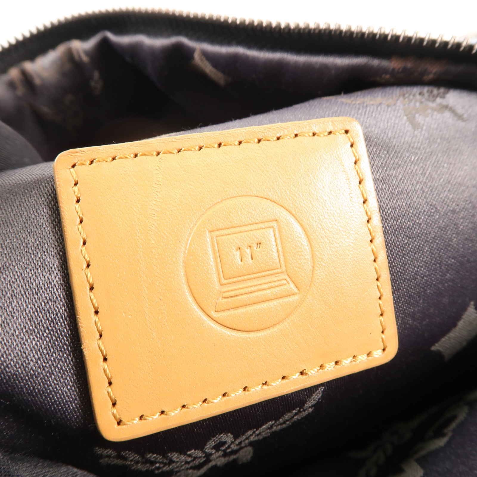 MCM 塗層帆布Backpack銀扣背包