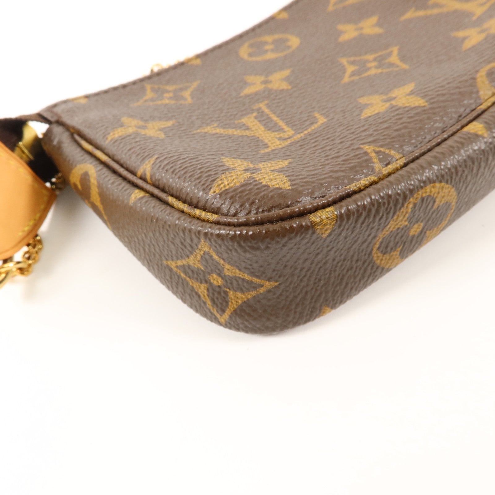 LOUIS VUITTON Monogram Mini Pochette Accessoires金扣手挽袋