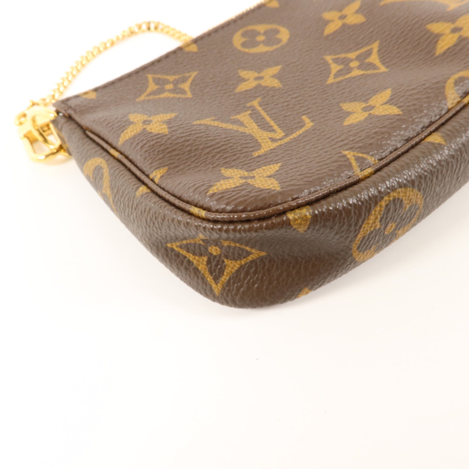 LOUIS VUITTON Monogram Mini Pochette Accessoires金扣手挽袋