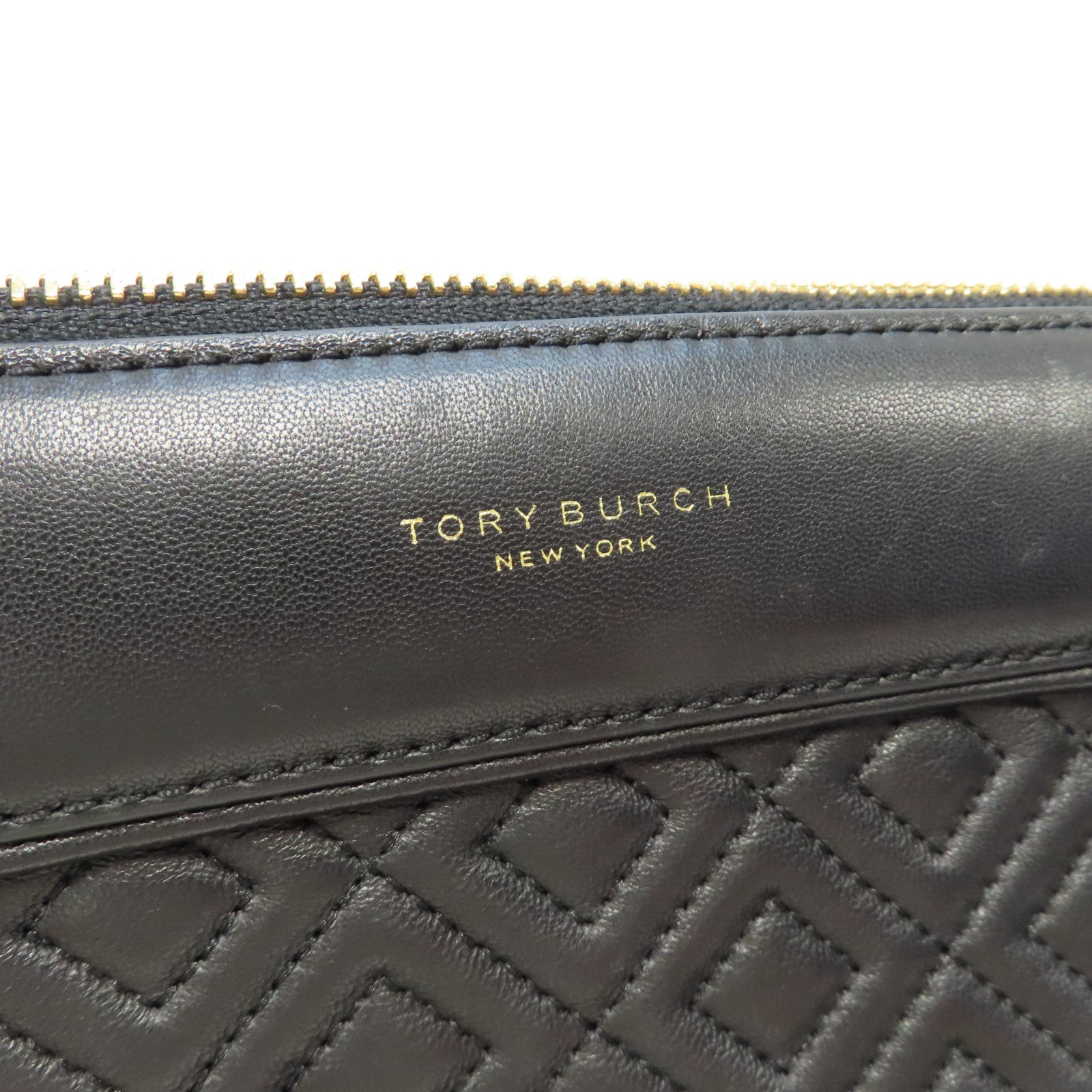 Tory Burch 【激減優惠】牛皮皮革Pouch金扣手拿包黑色