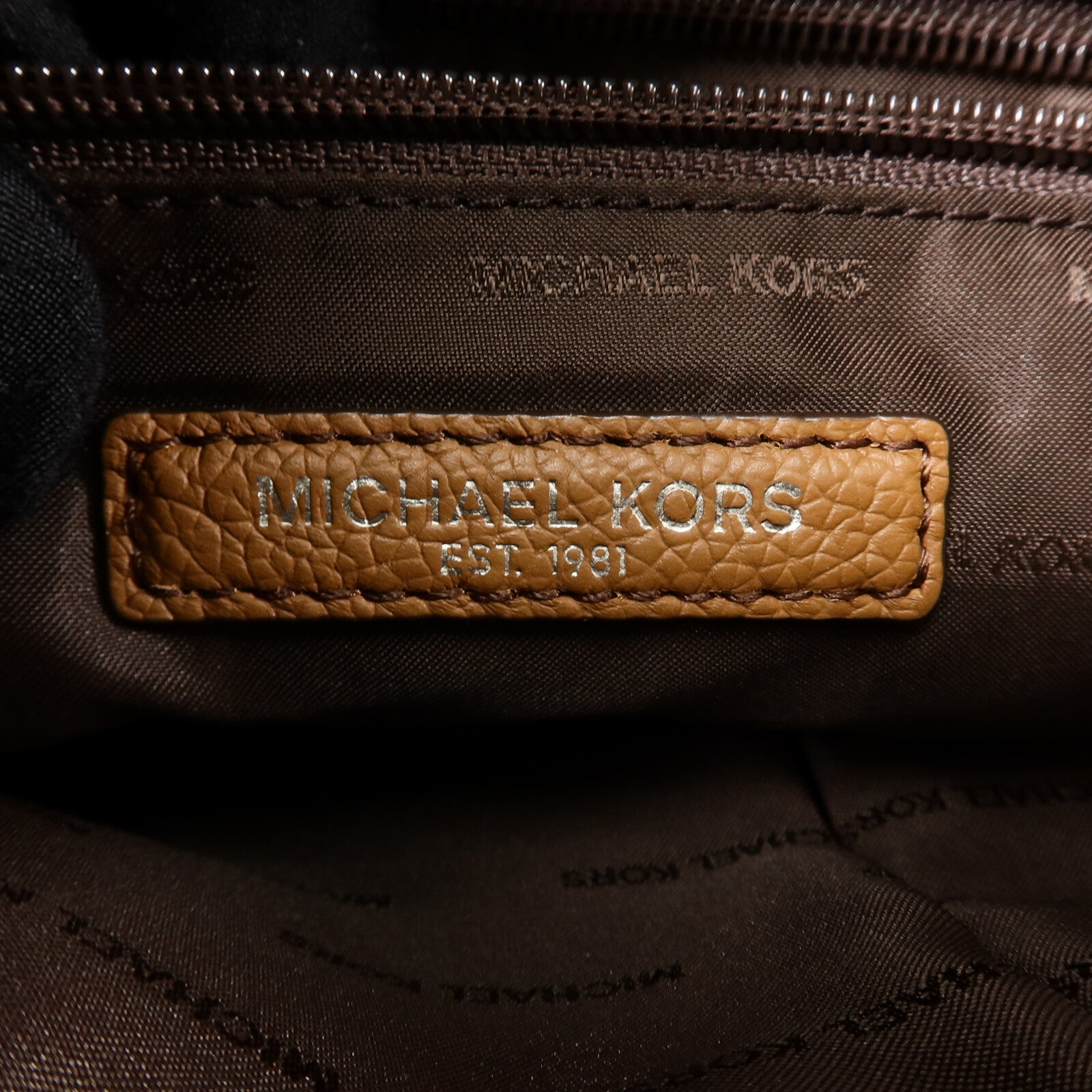 Michael Kors 牛皮皮革NS Messenger肩背袋