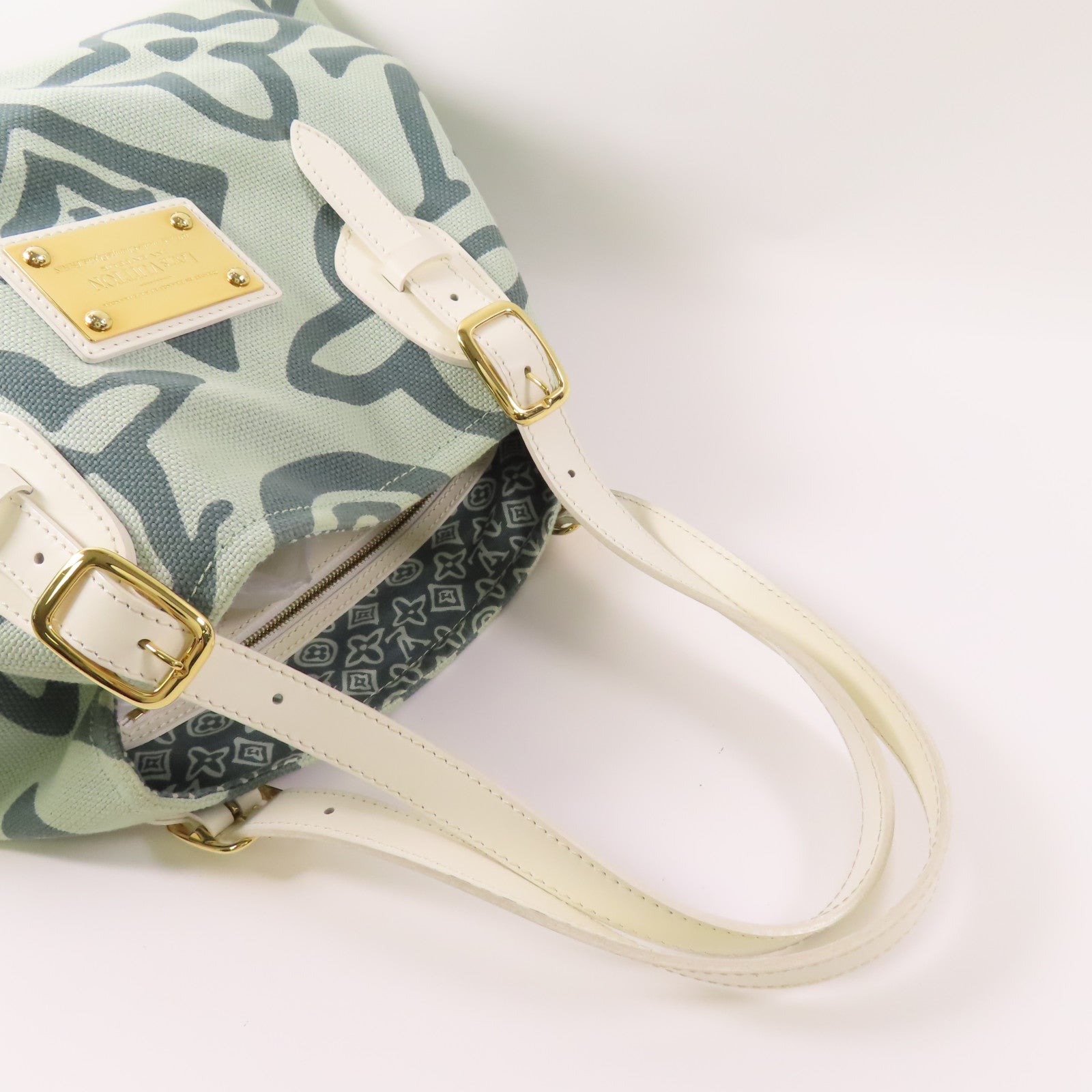 LOUIS VUITTON 帆布/皮革Tahitienne PM金扣肩背袋