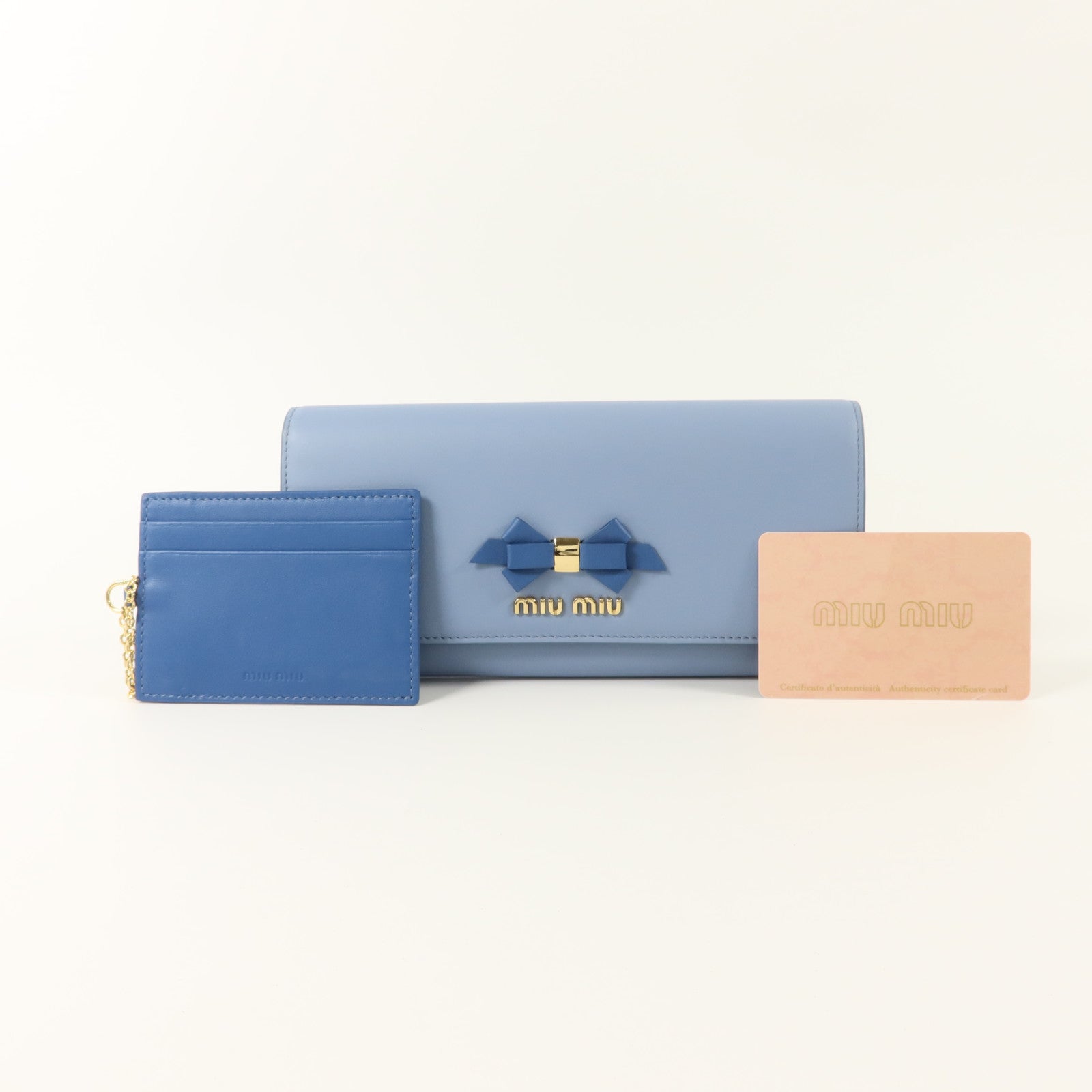 Miu Miu 牛皮皮革Long Flap Wallet with Pass Case金扣長錢包