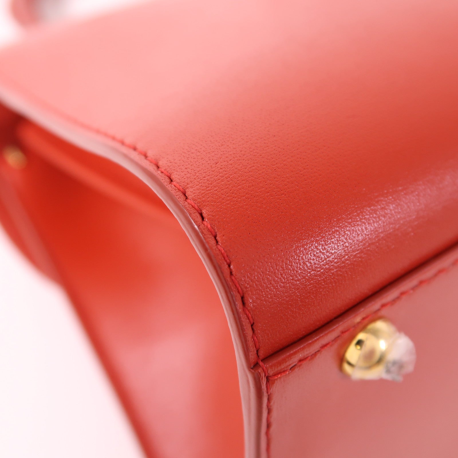 Delvaux 牛皮皮革Brillant Mini金扣手挽肩背兩用袋