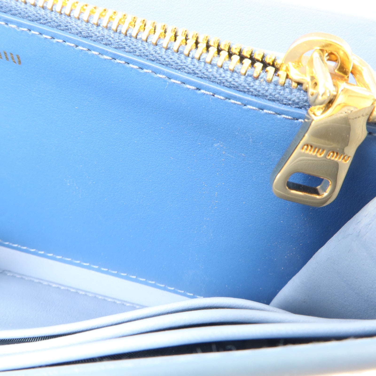 Miu Miu 牛皮皮革Long Flap Wallet with Pass Case金扣長錢包