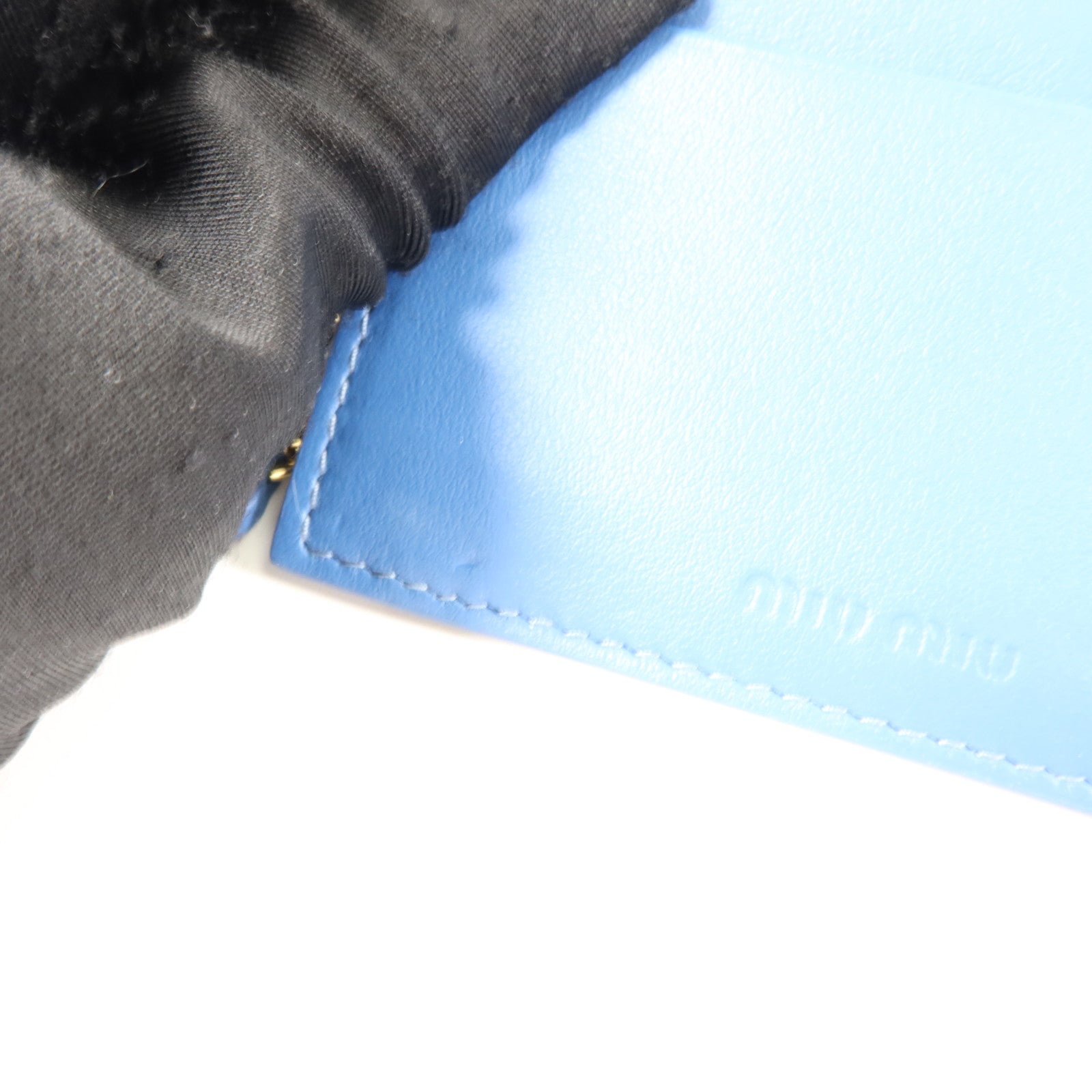 Miu Miu 牛皮皮革Long Flap Wallet with Pass Case金扣長錢包