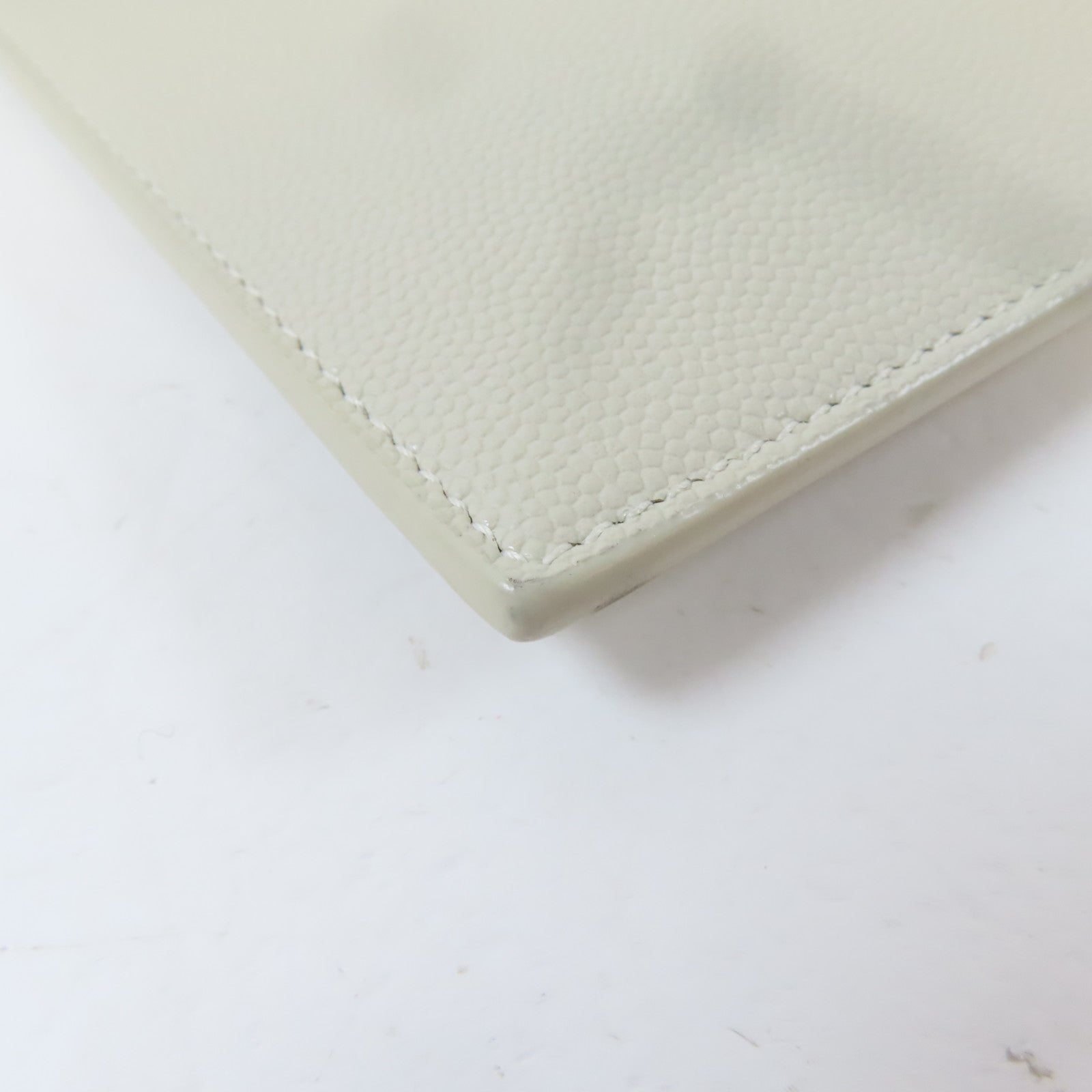 YVES SAINT LAURENT 牛皮皮革Clutch Bag金扣手拿包米色