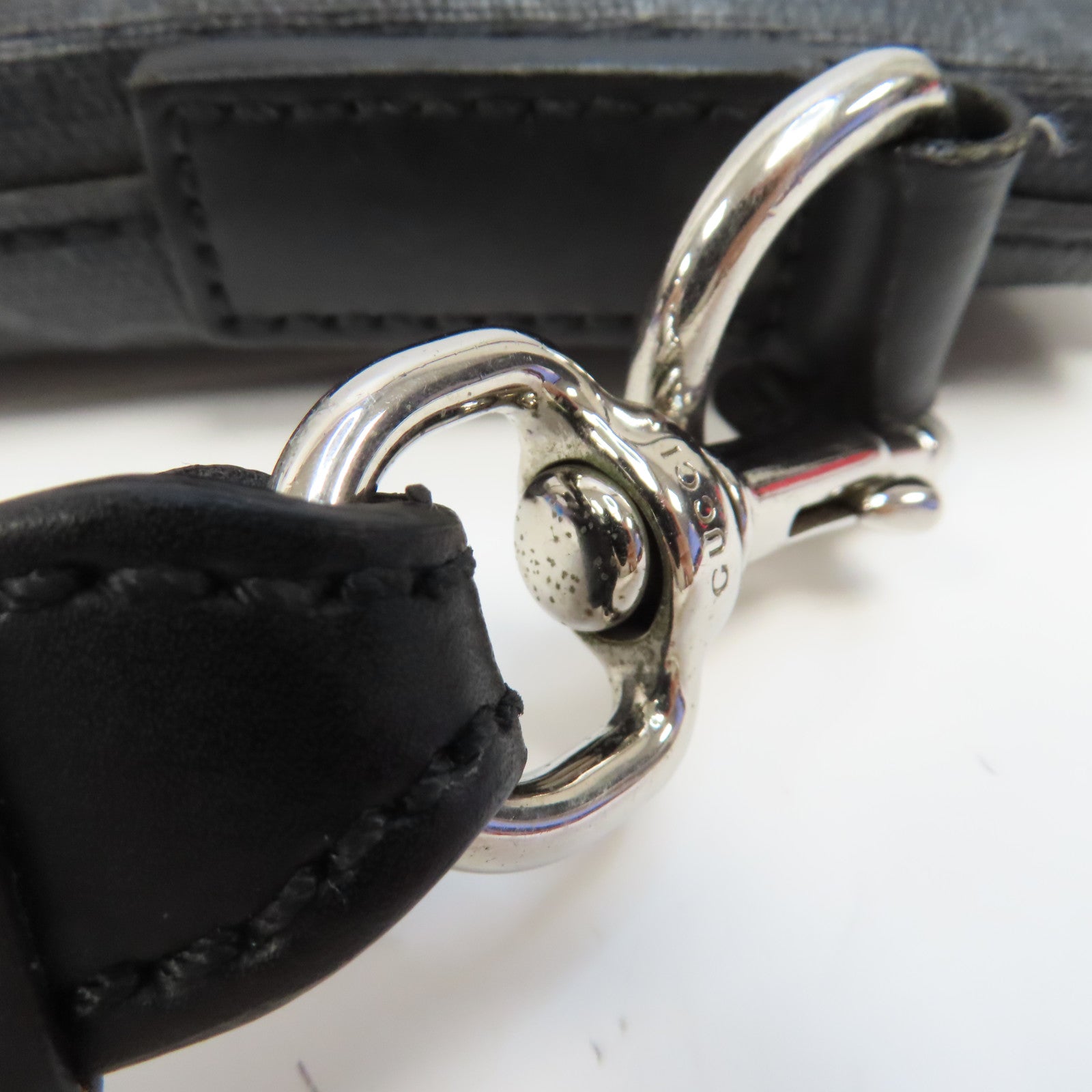 GUCCI 塗層帆布GG Supreme銀扣手拿包黑色