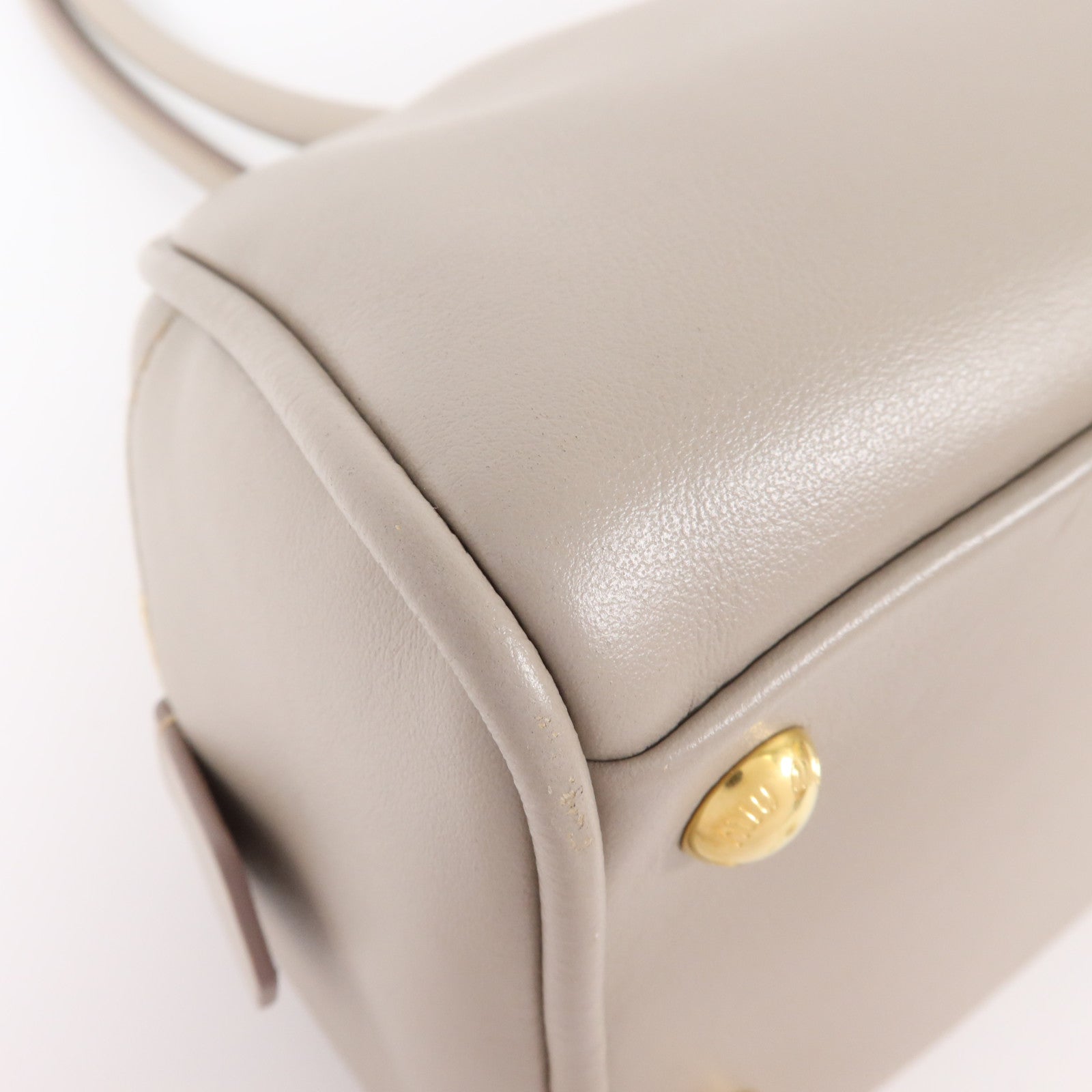 Miu Miu 牛皮皮革Beau金扣肩背袋