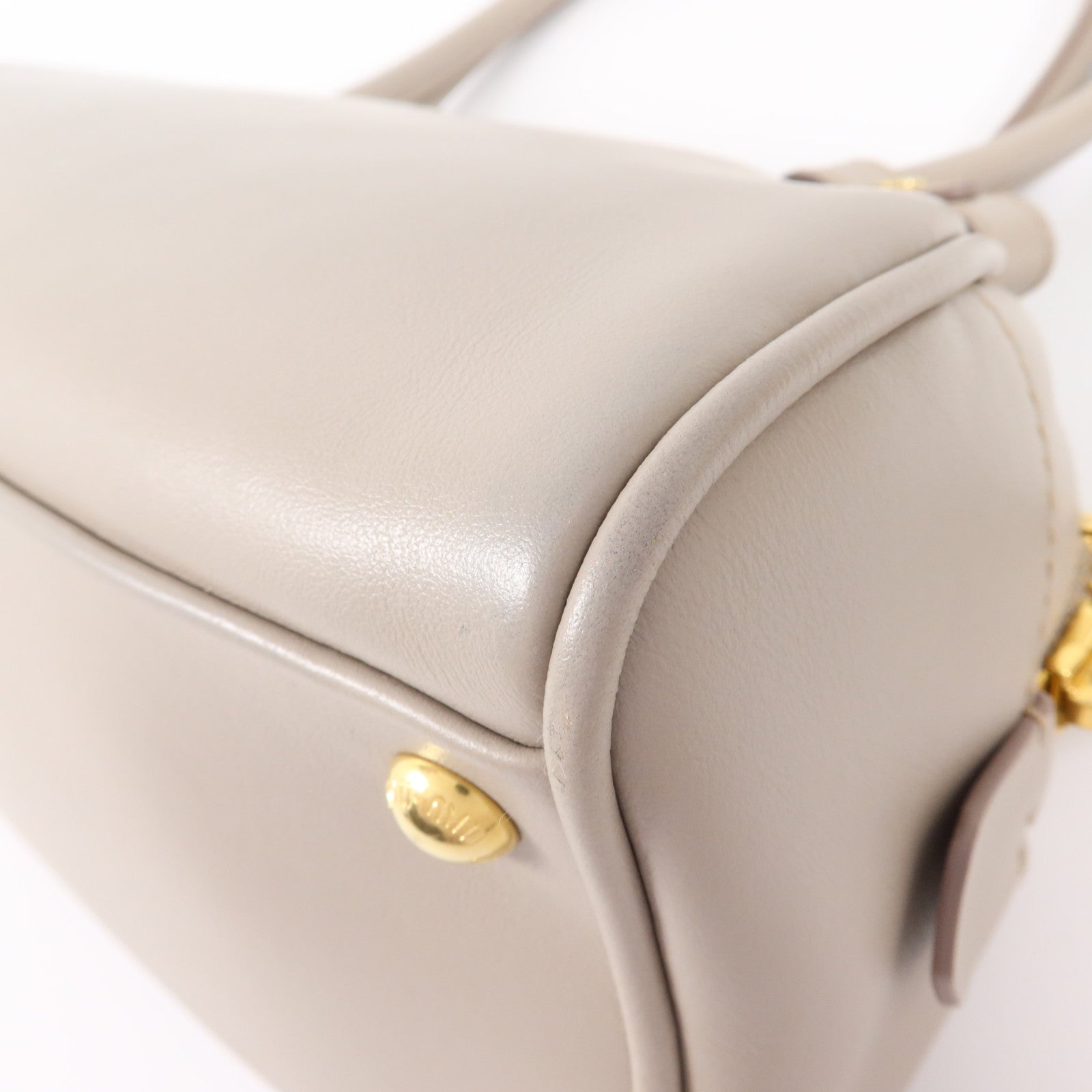 Miu Miu 牛皮皮革Beau金扣肩背袋
