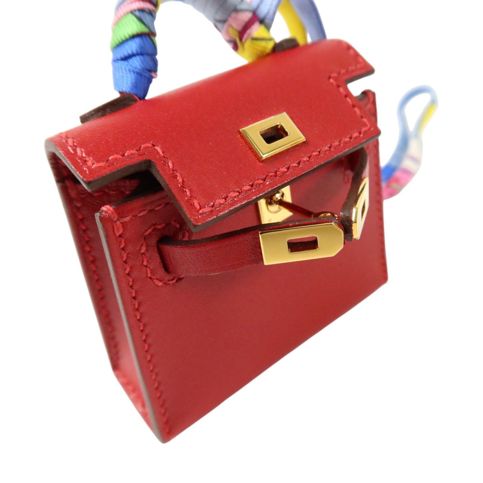 HERMES Tadelakt皮革/絲質Mini Kelly Twilly Bag Charm金扣掛飾Rouge Vif