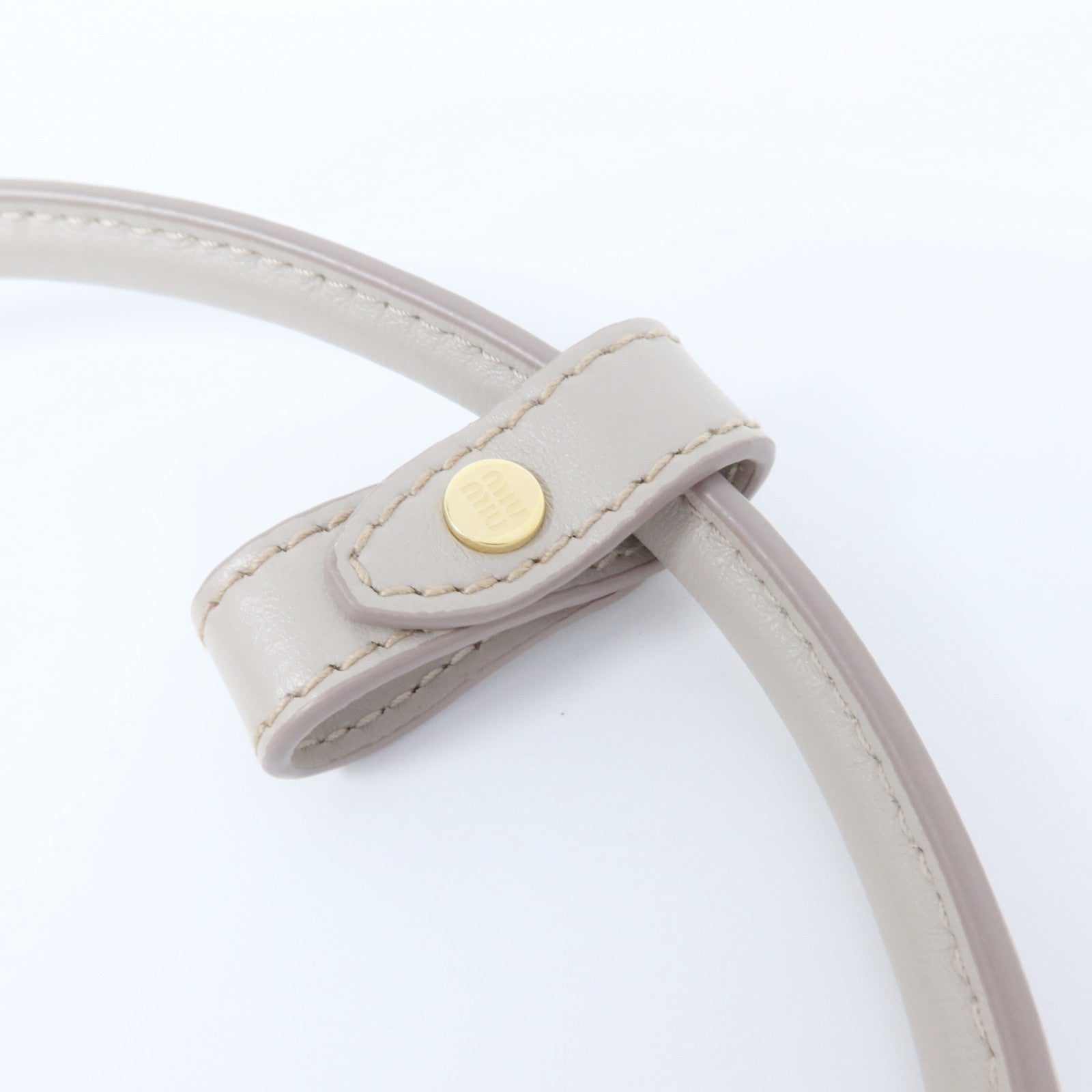 Miu Miu 牛皮皮革Beau金扣肩背袋