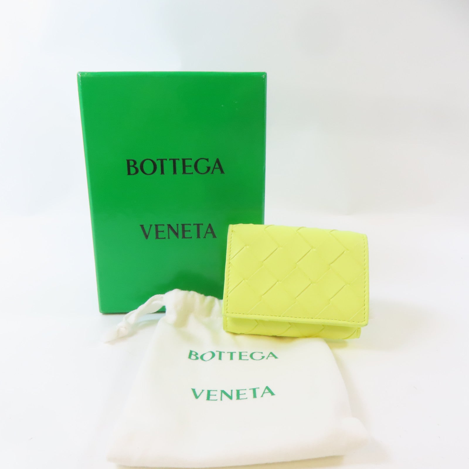 BOTTEGA VENETA 織紋牛皮皮革Trifold Wallet金扣錢包黃色