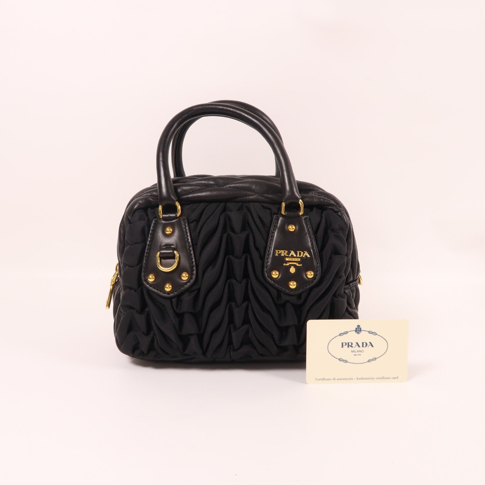 PRADA 尼龍/羊皮皮革Hand Bag金扣手挽袋黑色