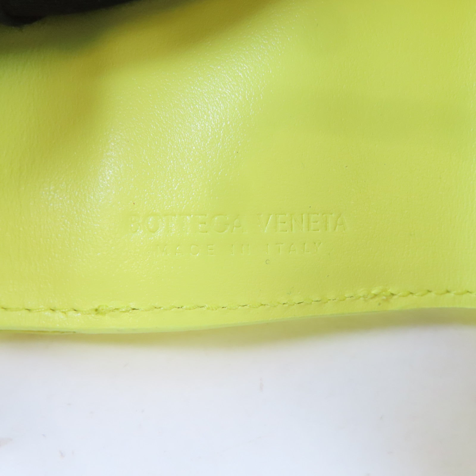BOTTEGA VENETA 織紋牛皮皮革Trifold Wallet金扣錢包黃色