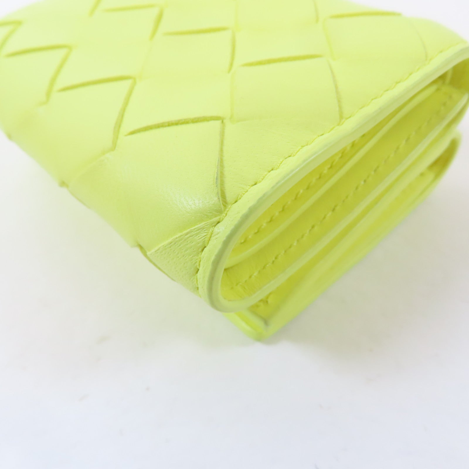 BOTTEGA VENETA 織紋牛皮皮革Trifold Wallet金扣錢包黃色