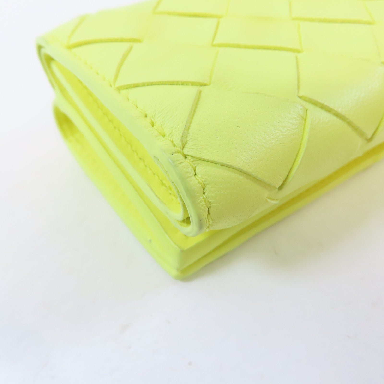 BOTTEGA VENETA 織紋牛皮皮革Trifold Wallet金扣錢包黃色