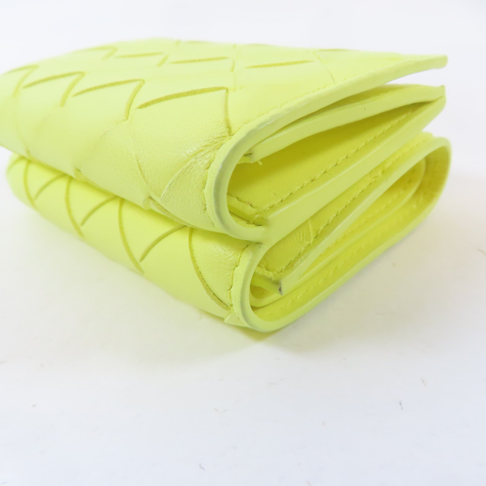 BOTTEGA VENETA 織紋牛皮皮革Trifold Wallet金扣錢包黃色