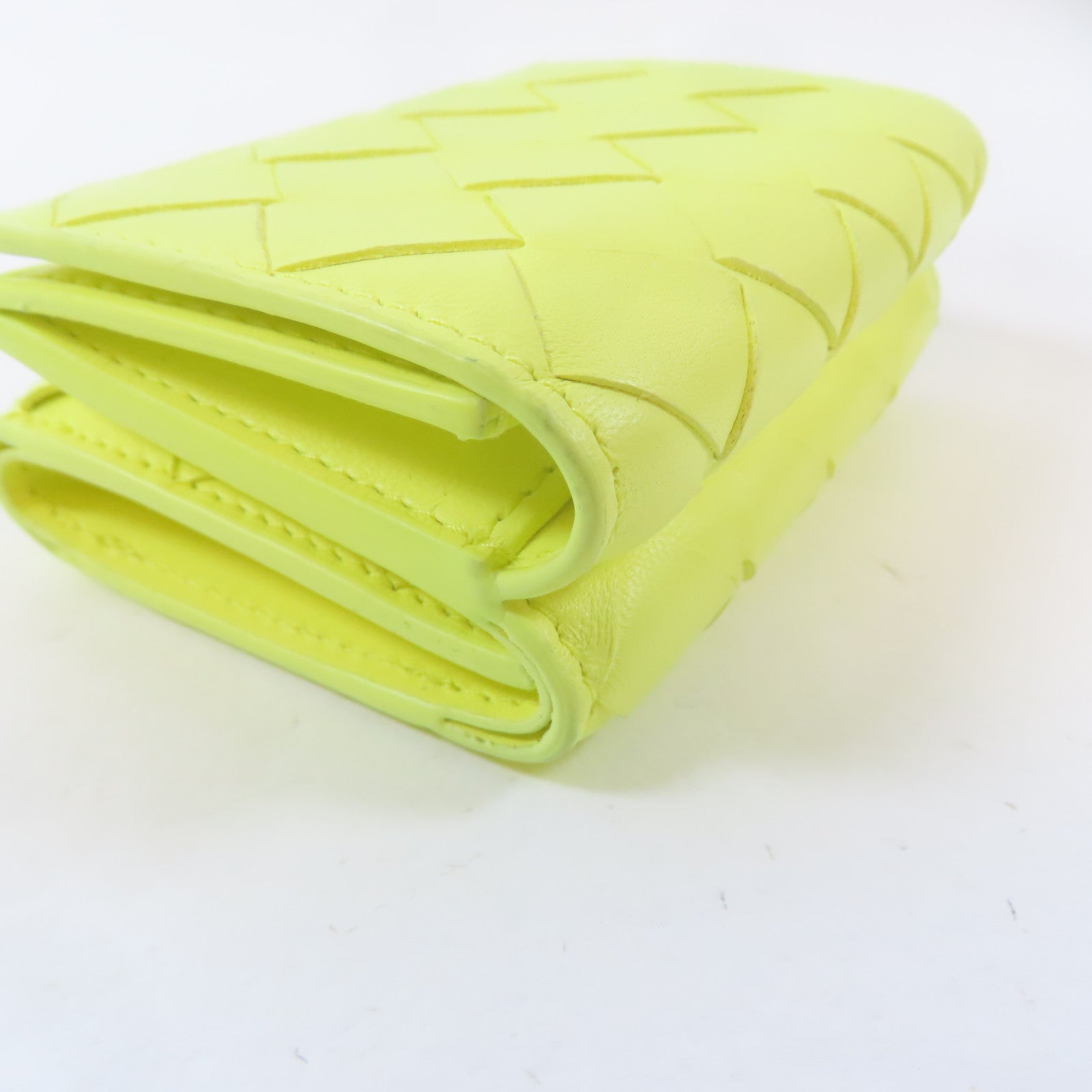 BOTTEGA VENETA 織紋牛皮皮革Trifold Wallet金扣錢包黃色