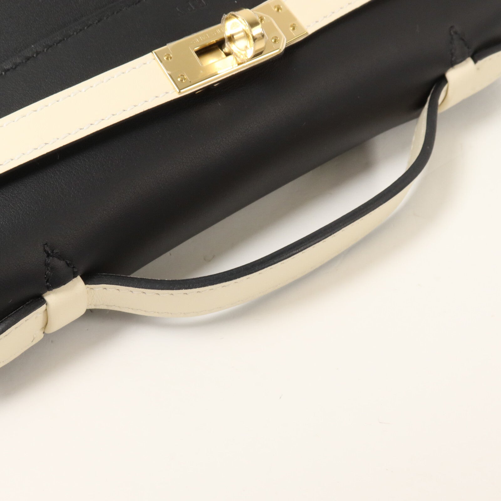 HERMES Swift皮革Kelly Pochette SPO手挽袋Noir/Craie
