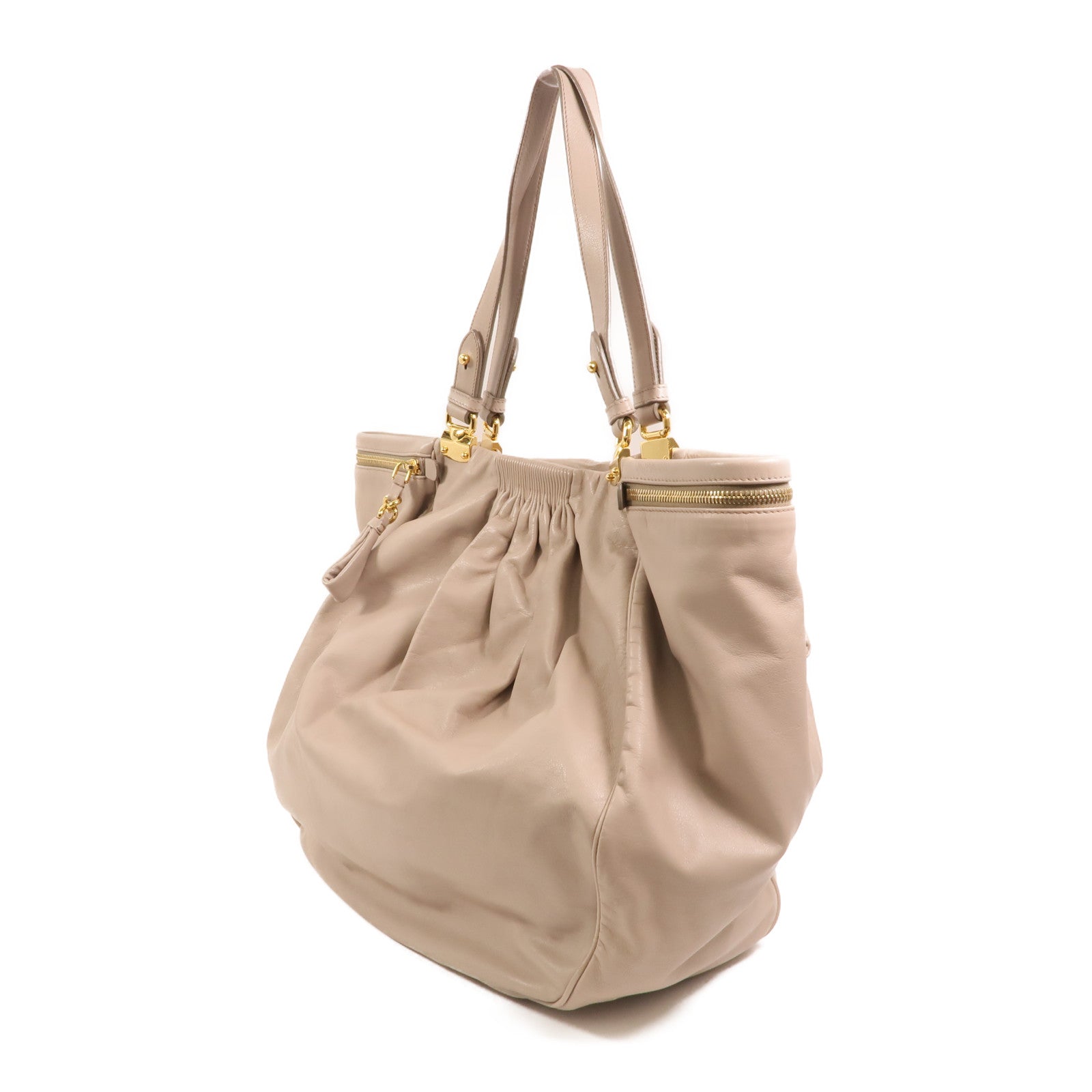 Miu Miu 牛皮皮革Vitello Lux Hobo金扣手挽袋