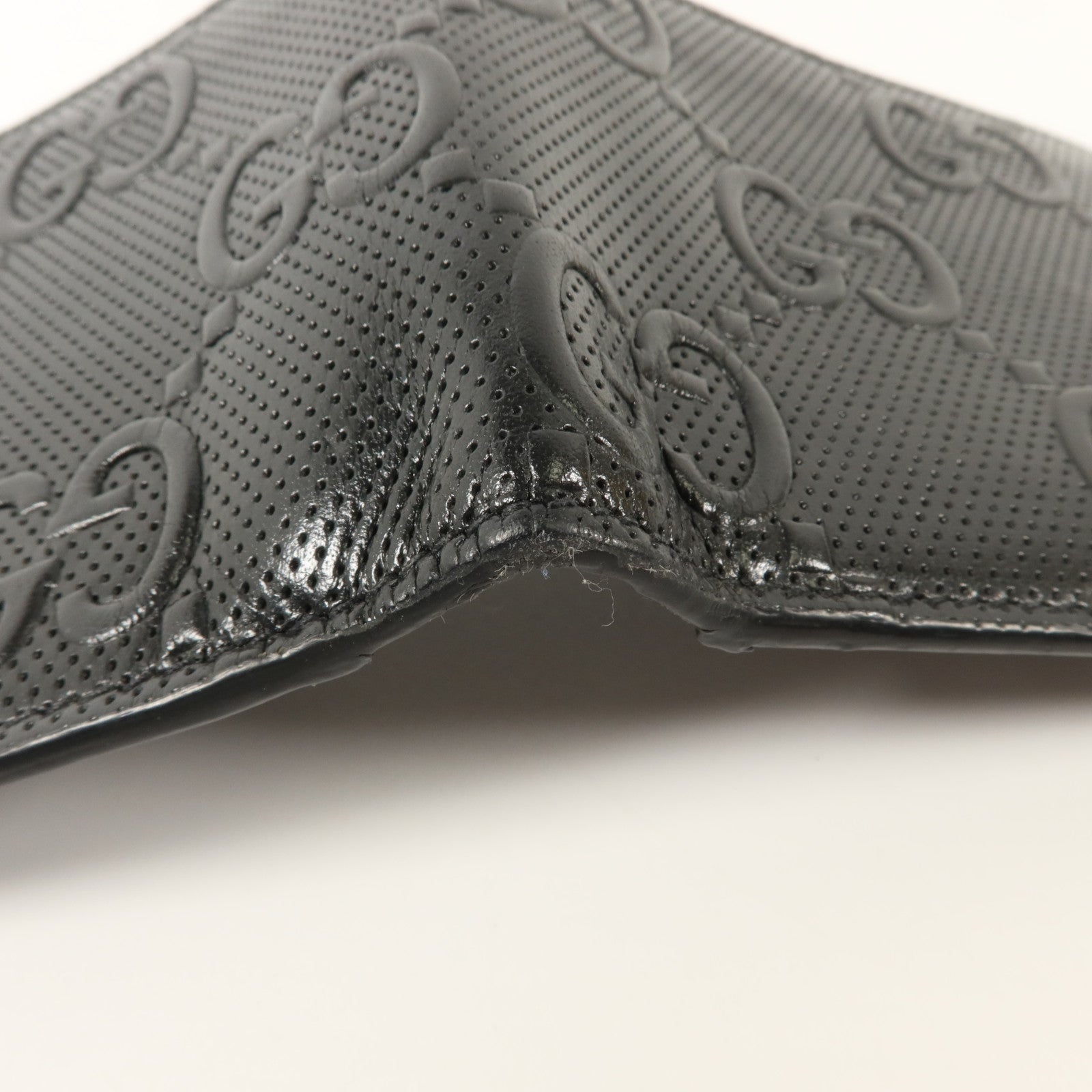 GUCCI 牛皮皮革GG Embossed Wallet錢包