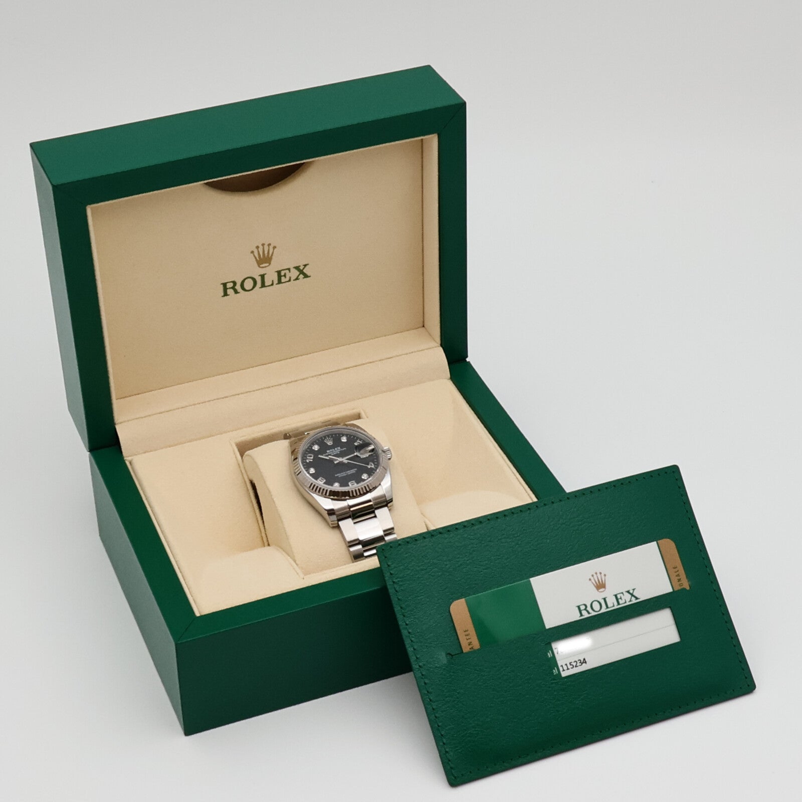 ROLEX Oyster Perpetual Date 115234G
