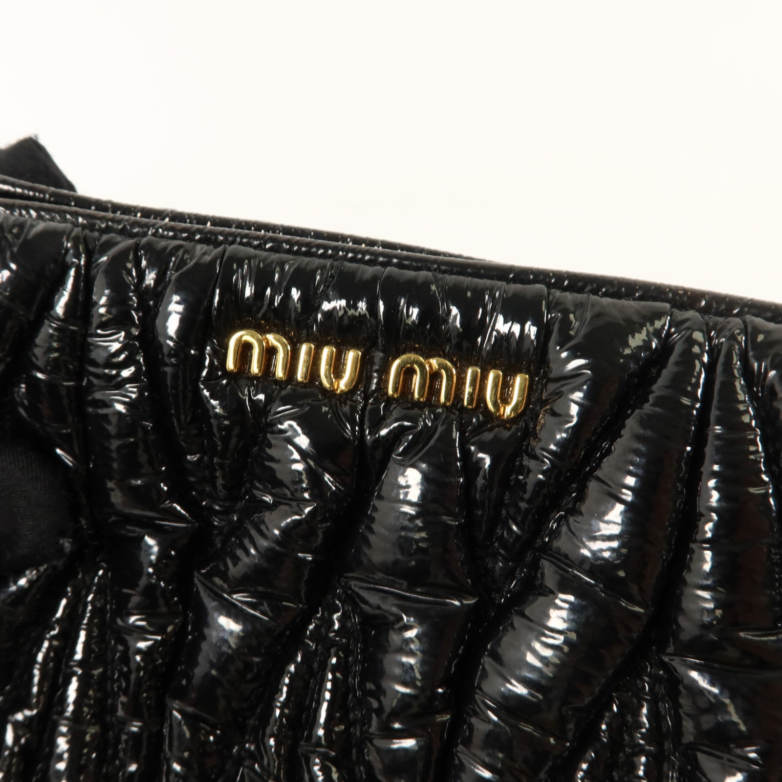 Miu Miu 漆皮皮革Clutch Bag金扣手拿包